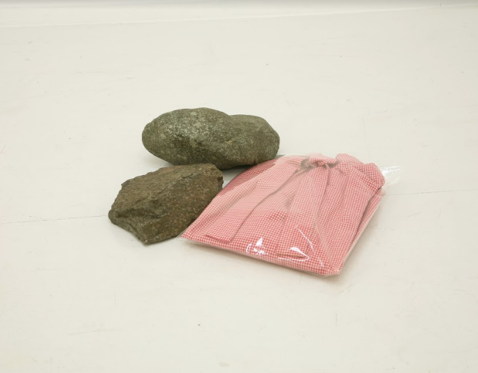 Eri Takayanagi, Clothes and Stones, 2011, Clothes, plastic bag, stones, 10.5 x 42 x 39.5 cm