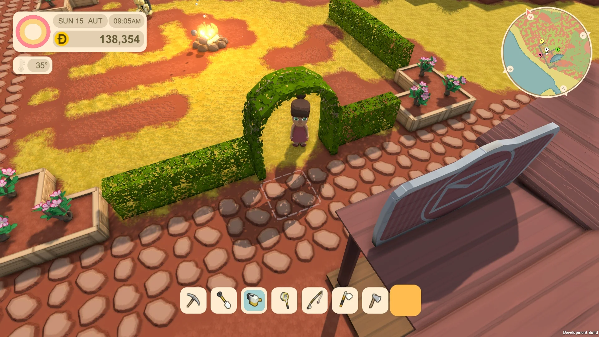 Hedge arch and flowerbeds to decorate your town.