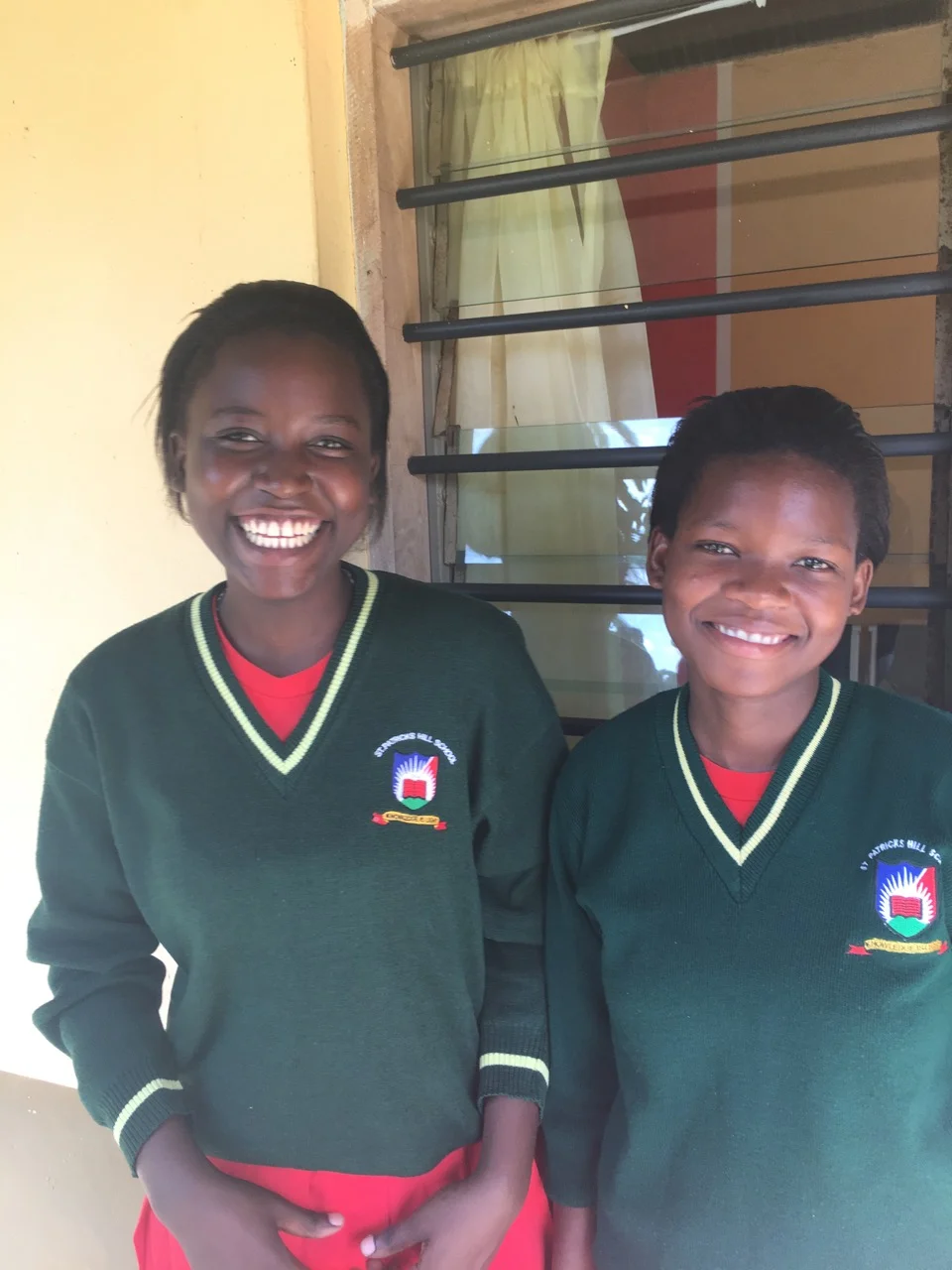 Linet (left) and Peris (right) at their school.