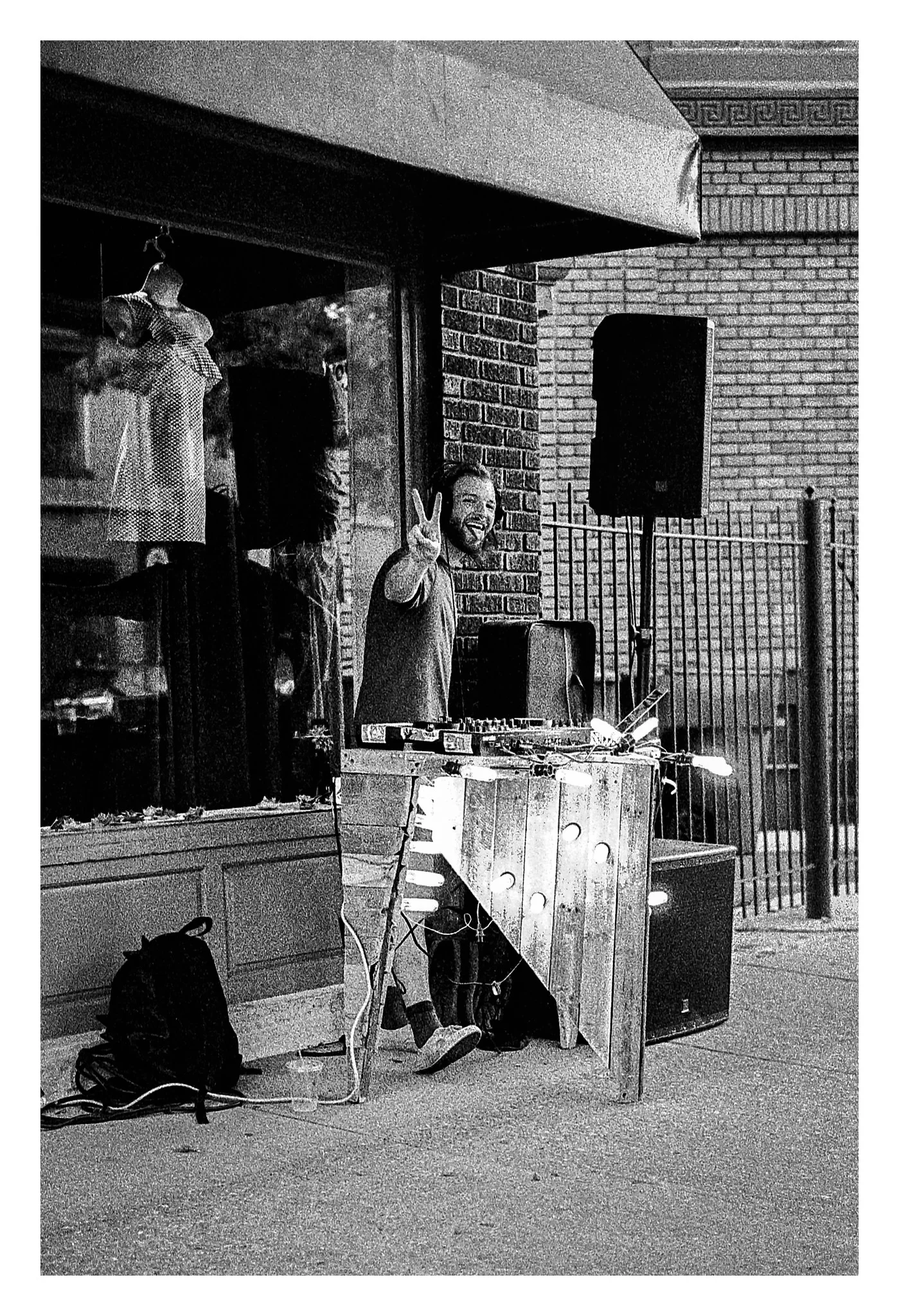 Sidewalk DJ - Nikon F5 with 50mm f/1.4 lens at f/2.8 in A-Priority mode on Kodak TMAX P3200 film