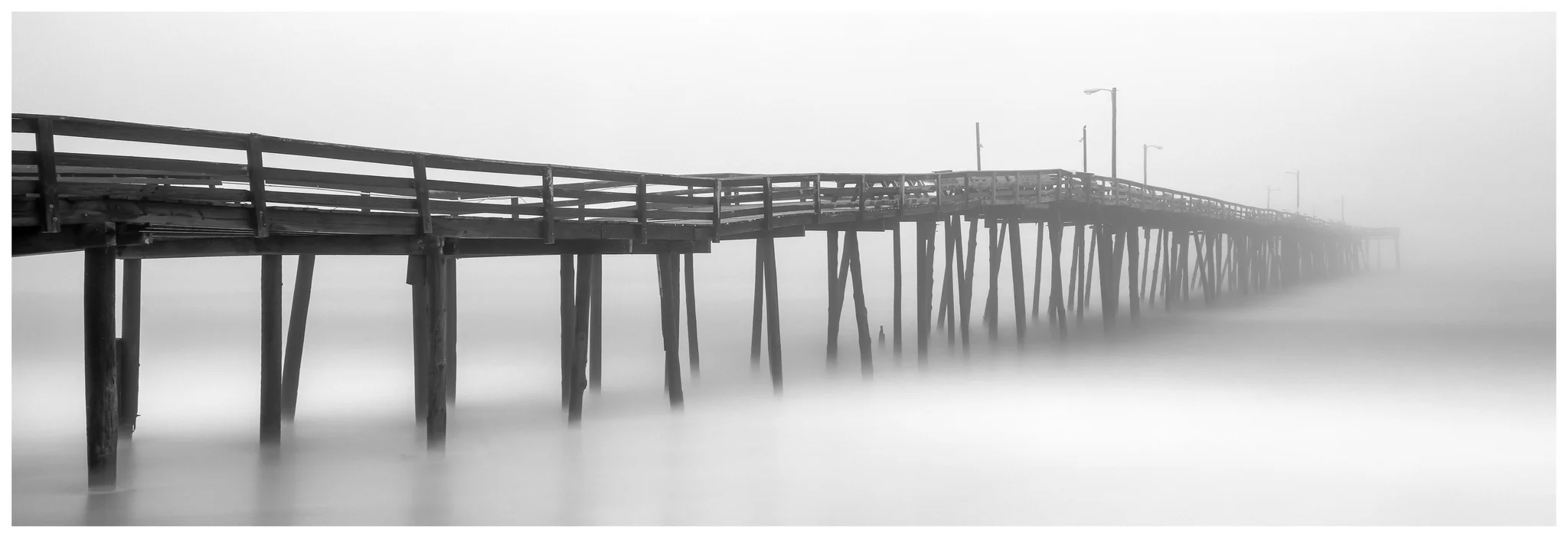 Nags Head Fishing Pier - Fuji GX617 w/105mm lens on Fuji ACROS film, long exposure with tide coming in.