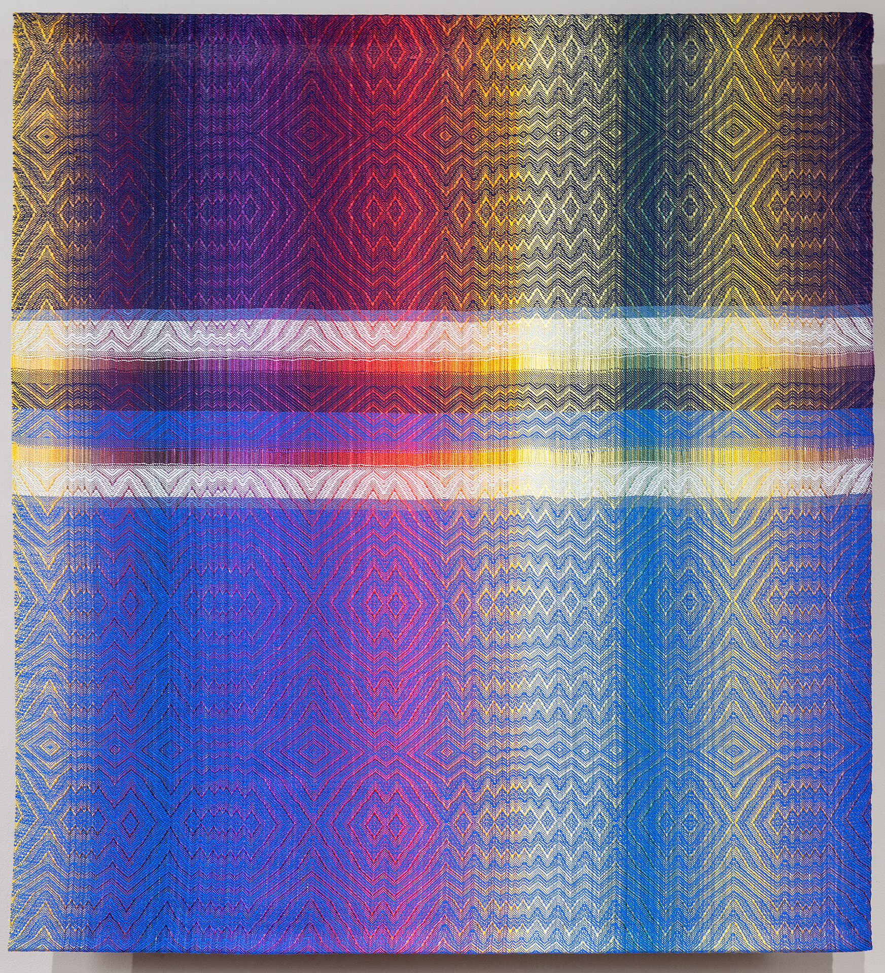 Title: More Shades of Autumn with Navy and Royal Blue Size: 38” wide x 41 ” long Medium: Hand-painted, hand-woven Materials: tencel Cost: $4,200.00 To purchase this piece, please click on this link.