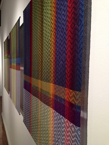   Sixty-Five Colors with White Three Woven Wall Hangings   Hand-dyed, Hand-woven  31” wide x 36” long (each) 
