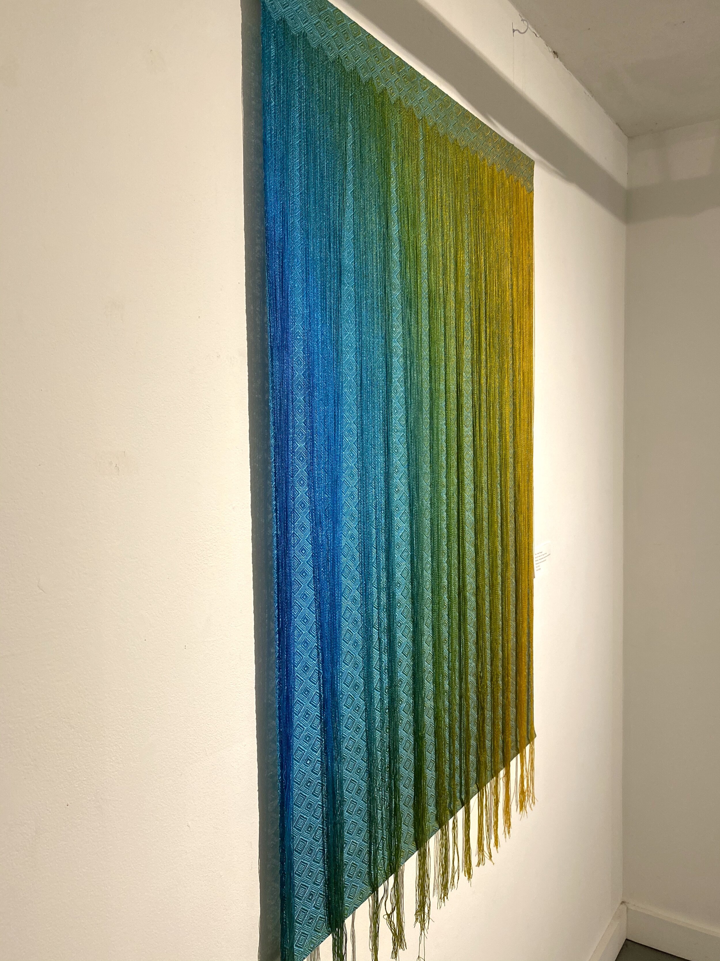  Title:  Pulled Through Installation and Threads   Size: 37” wide x 46” long   Medium: Hand-painted, hand-woven  Materials: tencel   For process information and pricing, please contact us by clicking on this  link .    