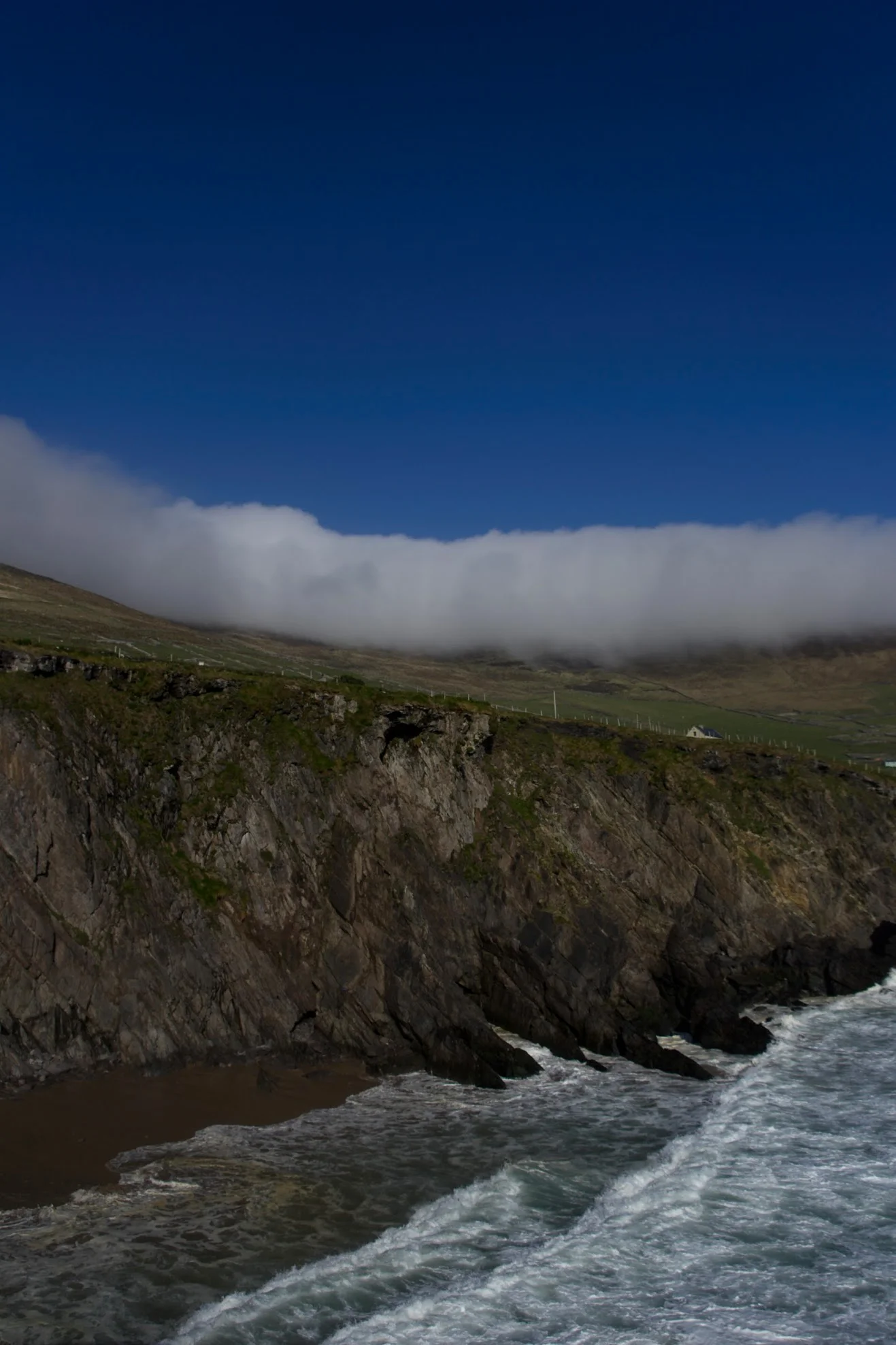 Along the southern side of Dingle Peninsula — following Slea Head Drive. This is Slea Head Beach . (Get directions by clicking the image.)