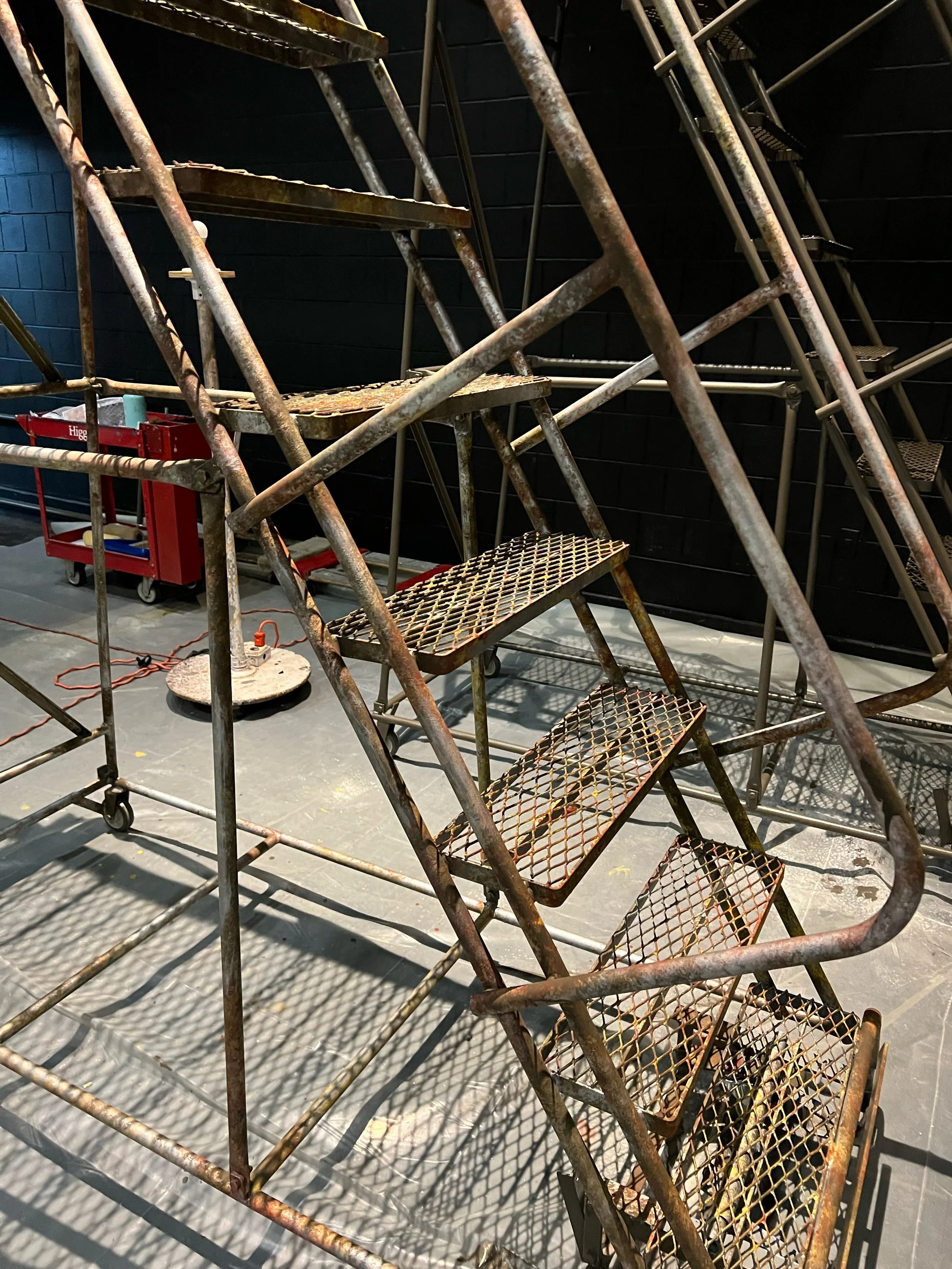 "Fiedlio," faux rusted staircases, painted with Rosco supersats and Modern Masters