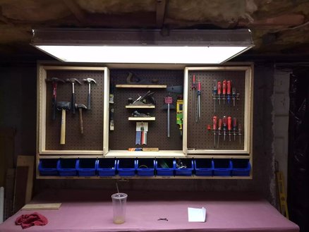 Pegboard Cabinet with Moving Doors