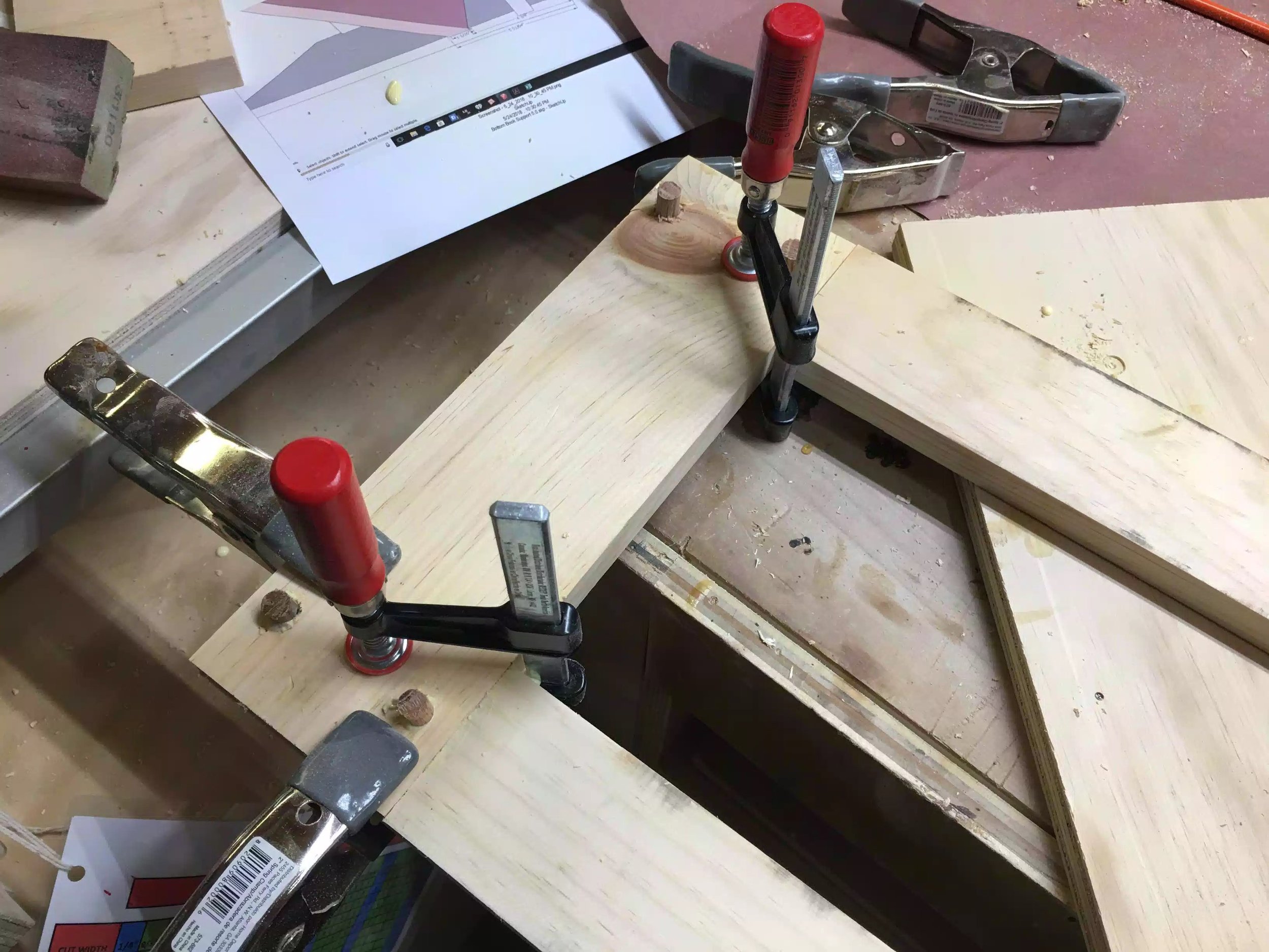 Here you can the glue has been apllied and the dowels are in place, just waiting for the glue to drive to cut the dowels flush with the face of the legs