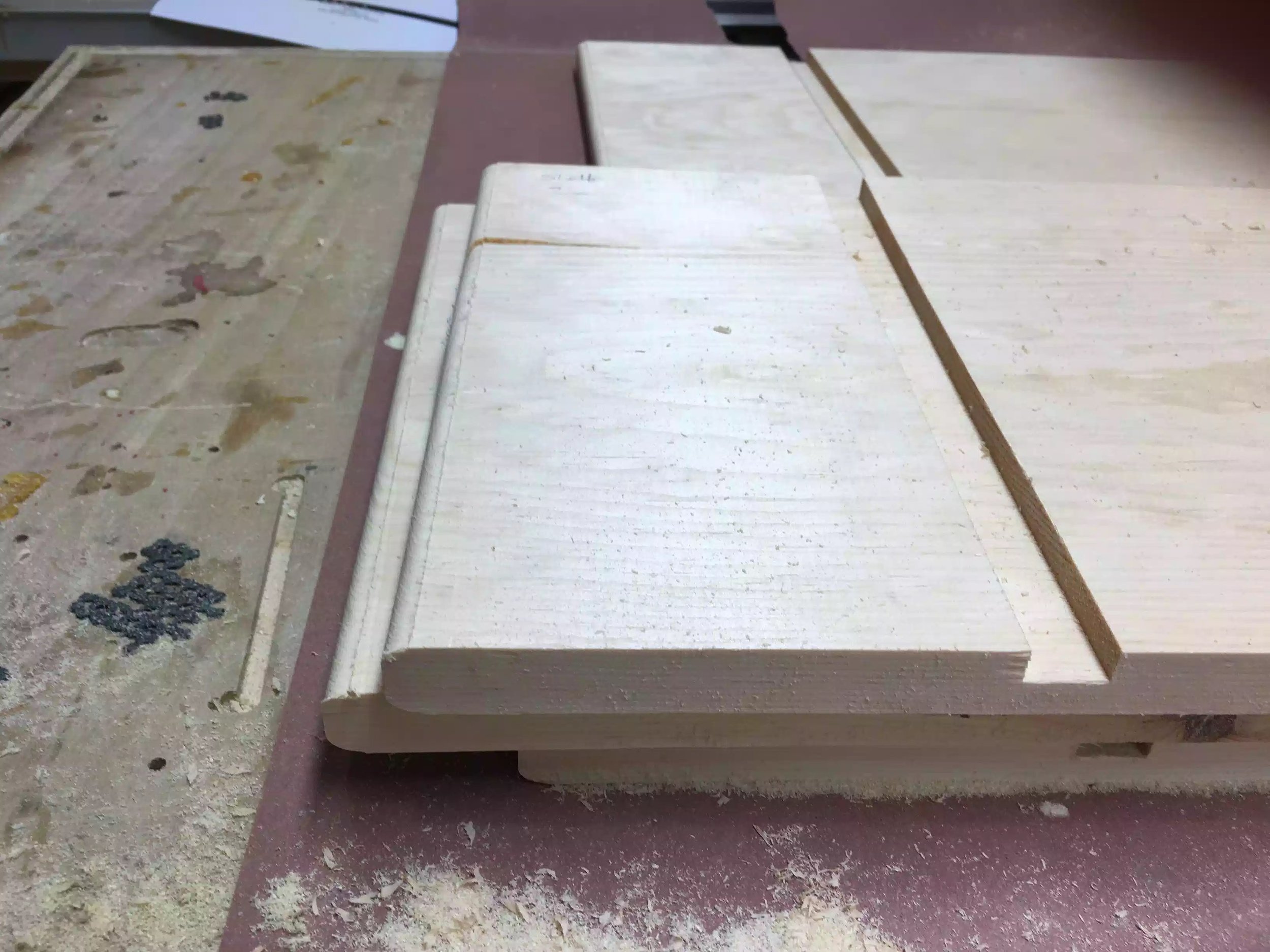 In this picture you can see I just added the round-over profile to the shelf ends, I used my palm router to achieve this. I will sand all these parts down .