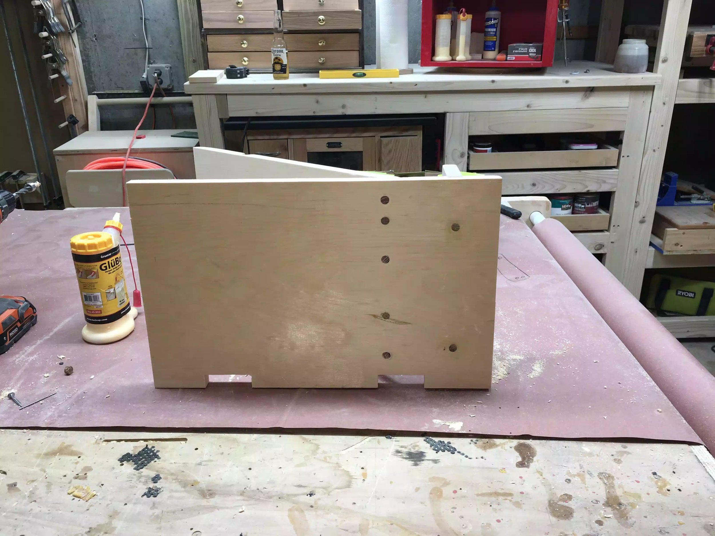 This is the base and the 2 holes on the right hand side are the screw holes keeping the book end in place.