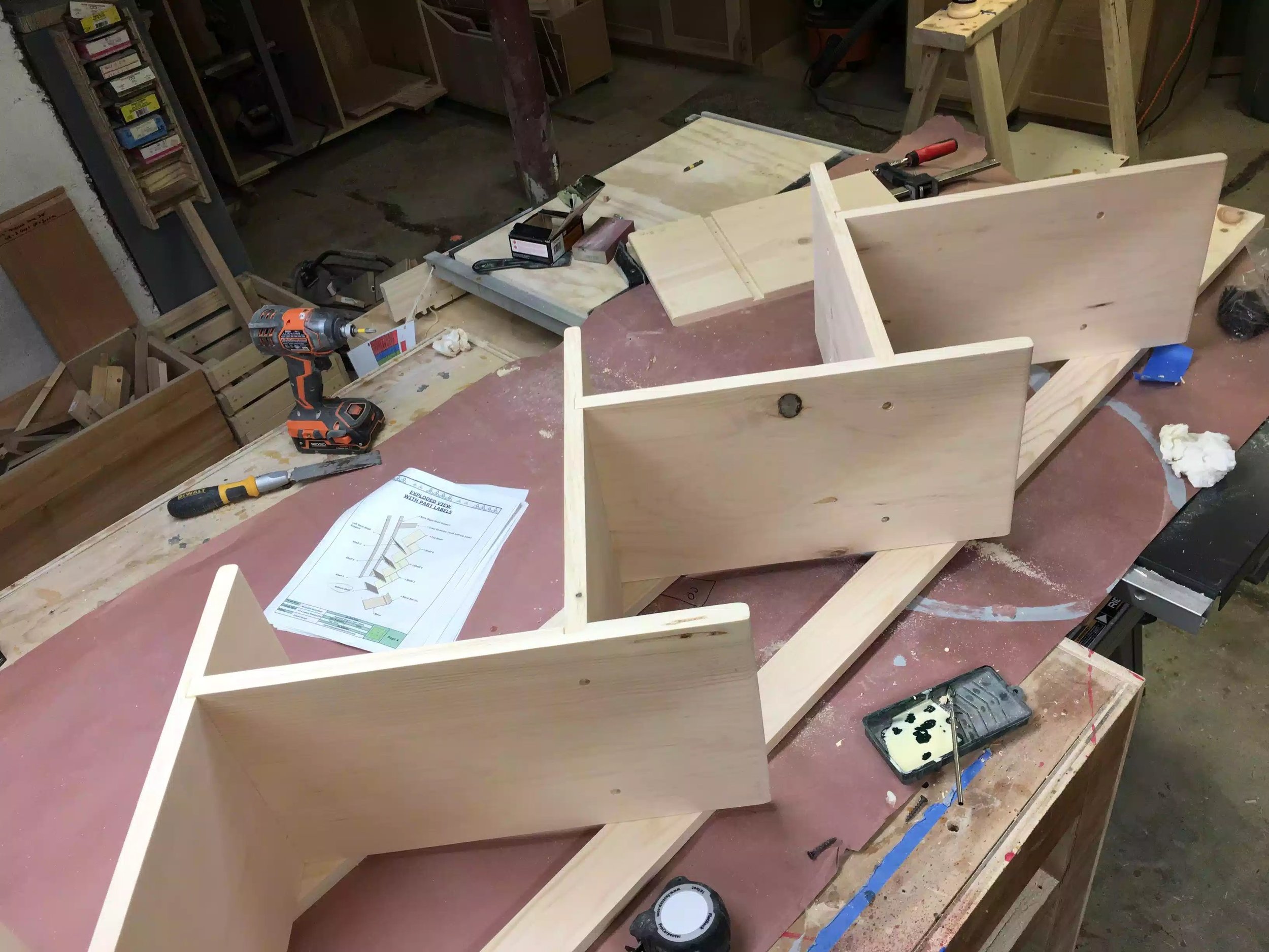 You can see why I chose this method it was easy to access all counter sunk screw holes, I also laid the shelves on the back legs true up the different board widths in this project