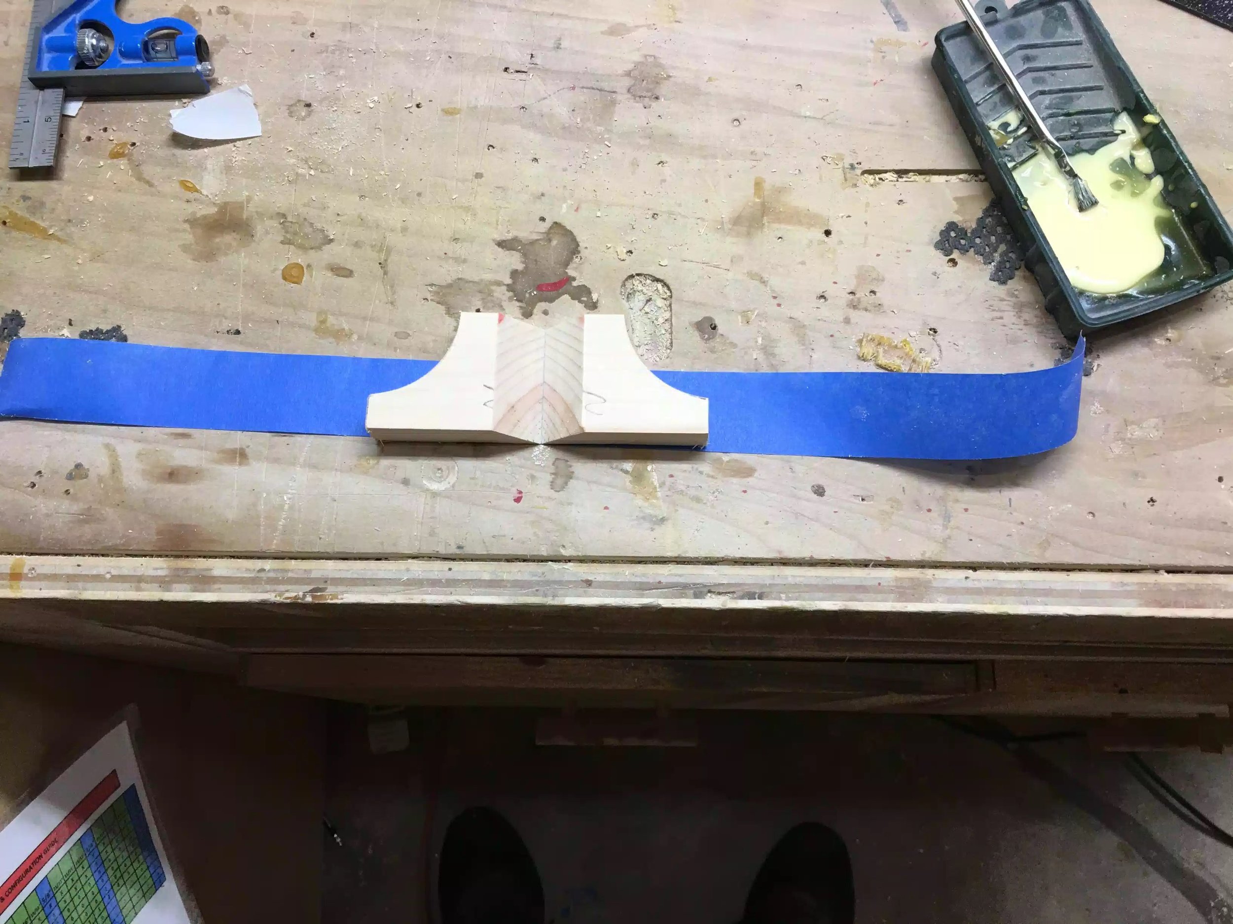 So after cutting all the bevels in the feet I used my trick with the painters tape as mentioned before. You can tell the grain will match around the leg because you can see the growth lines match perfectly in the beveled cuts on the legs