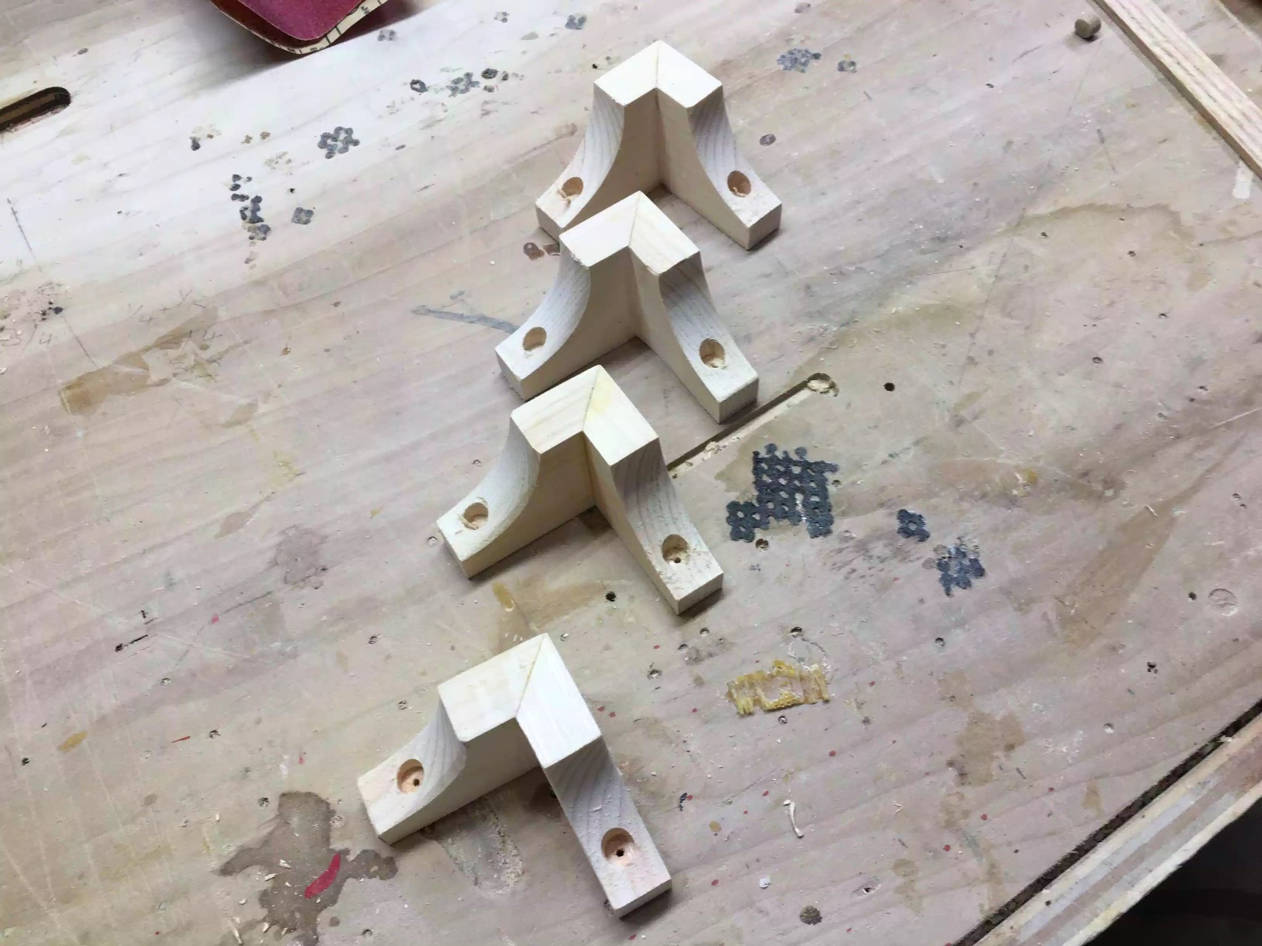 Here you can see the mounting holes in position, I also used a little 1/8" drill bit to clear the hole to the other side because a forstner bit only clears out so much wood it isnt designed to go all the way through