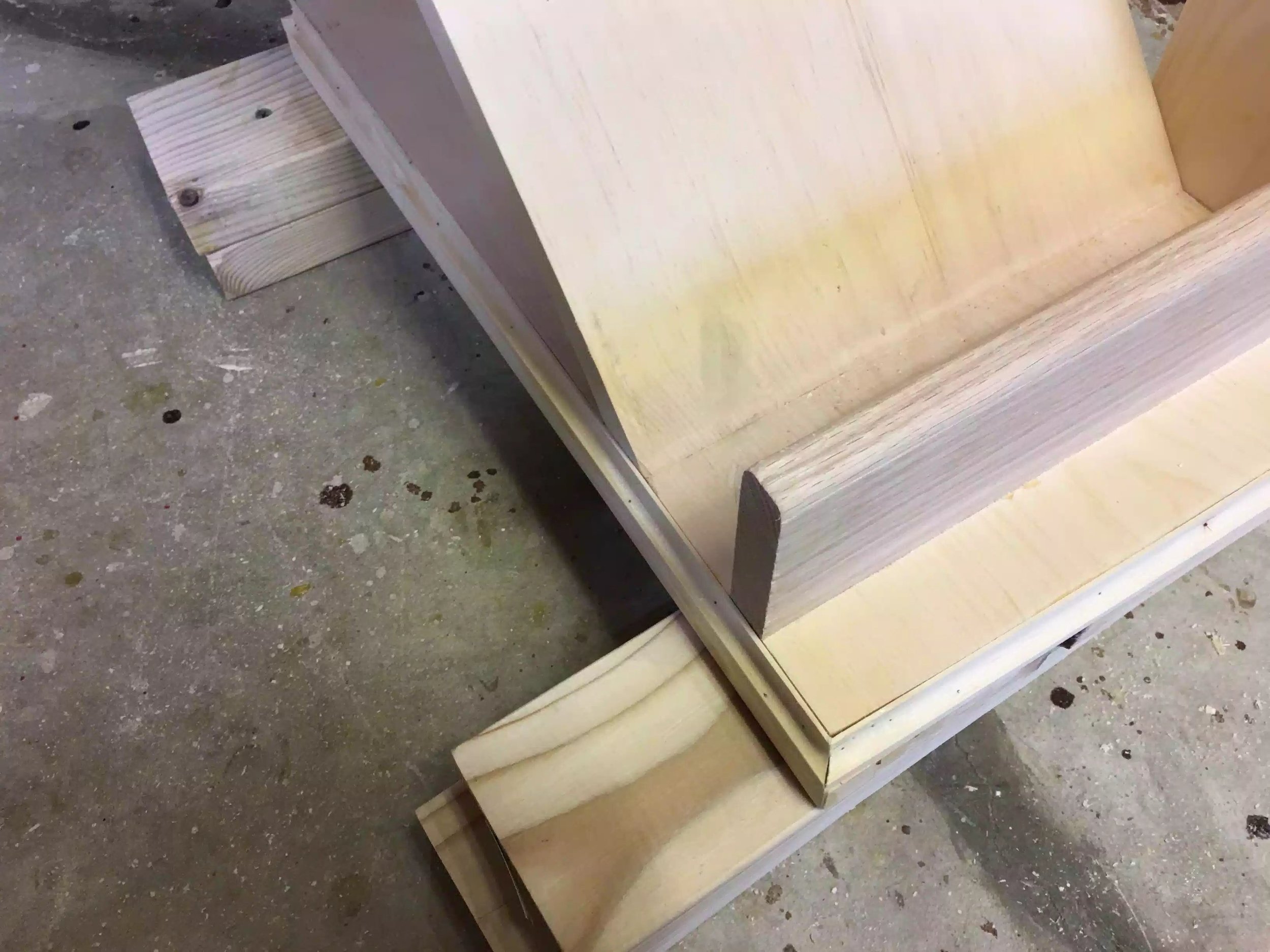 Here is a close-up of the cove molding, need to clean up the brad pin marks and then sand it all down.