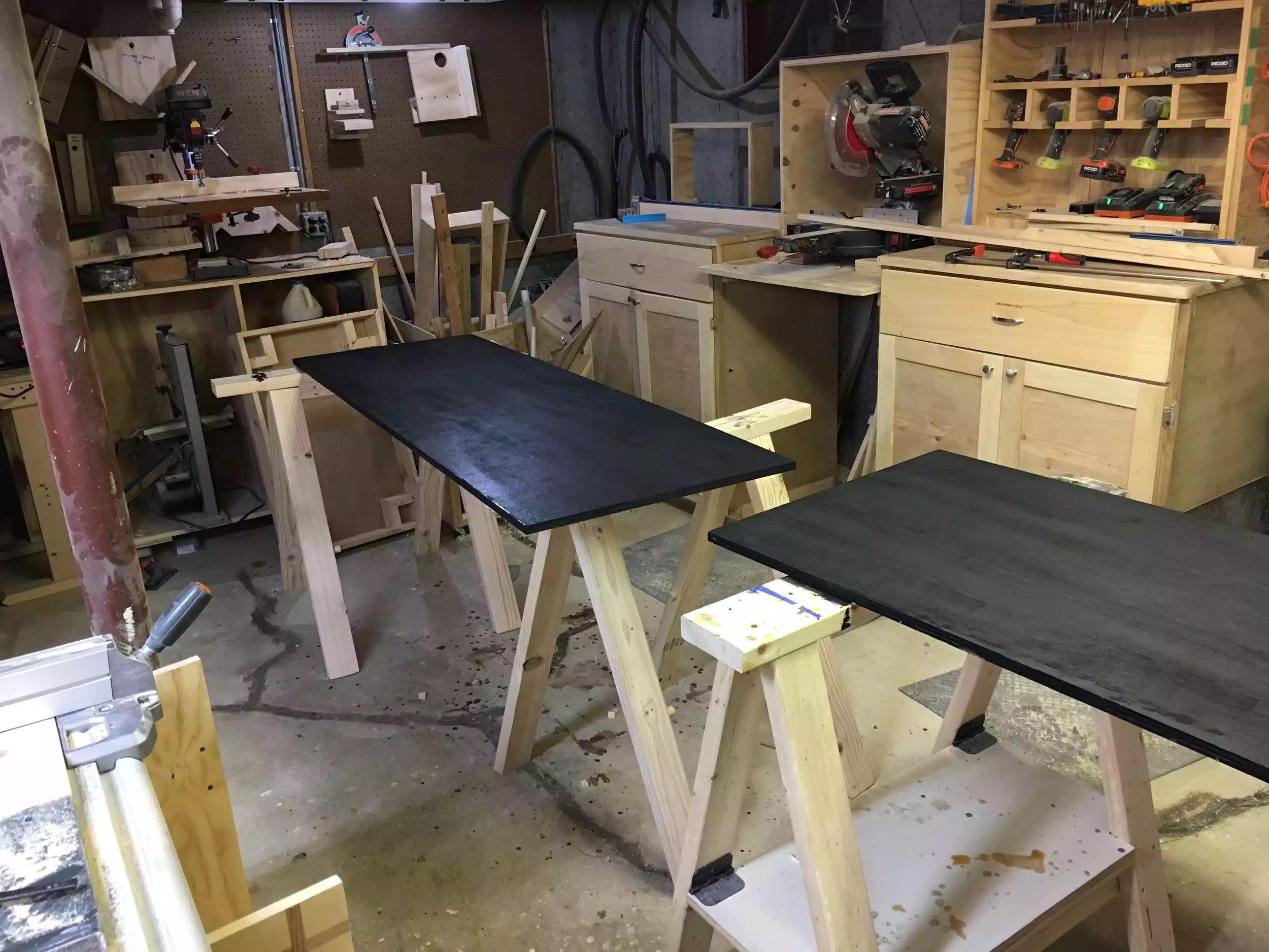 Only one side of the boards will be painted black as I have other plans for the back side. Here are the 2 panels all painted, I will let them dry over night.