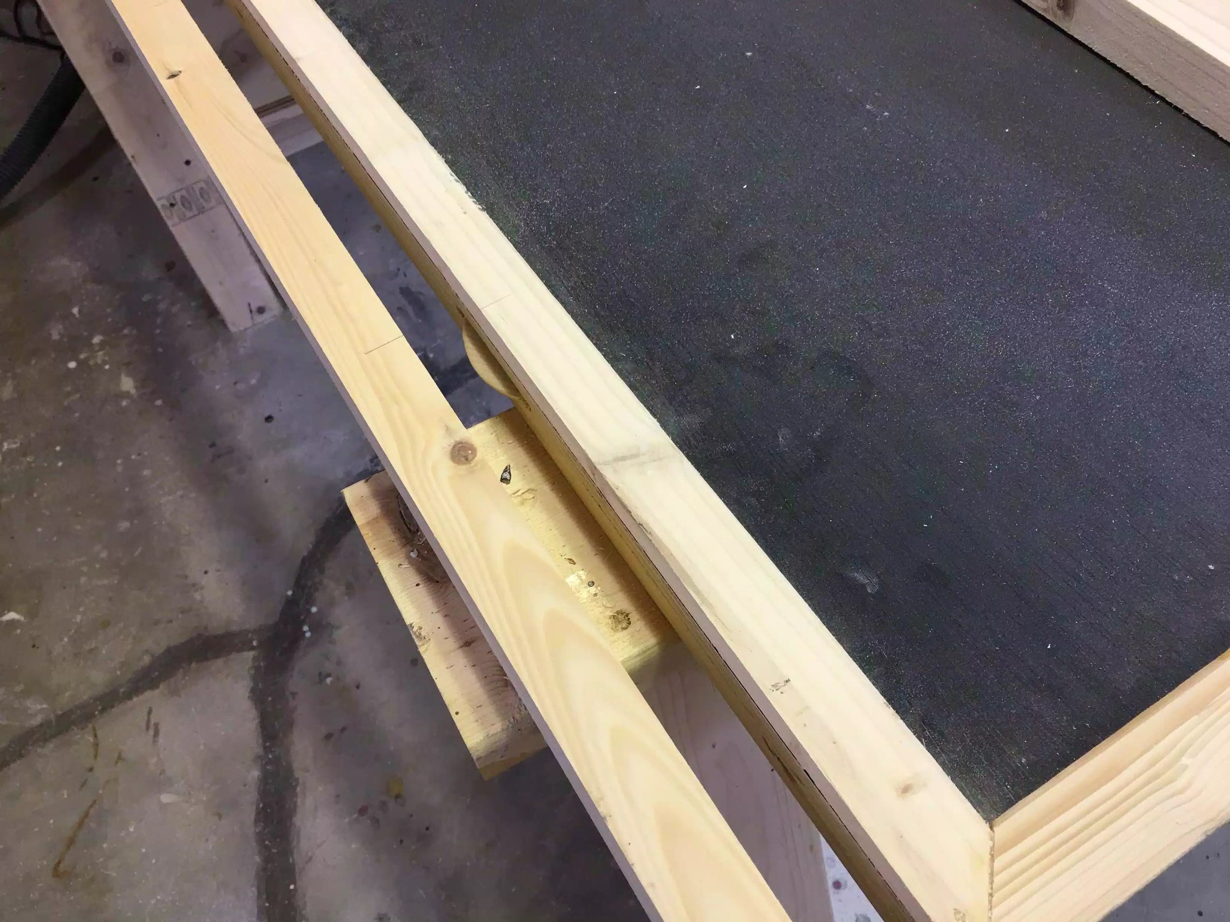 Same as before using the biscuit slots to join the leg piece to the plywood frame.