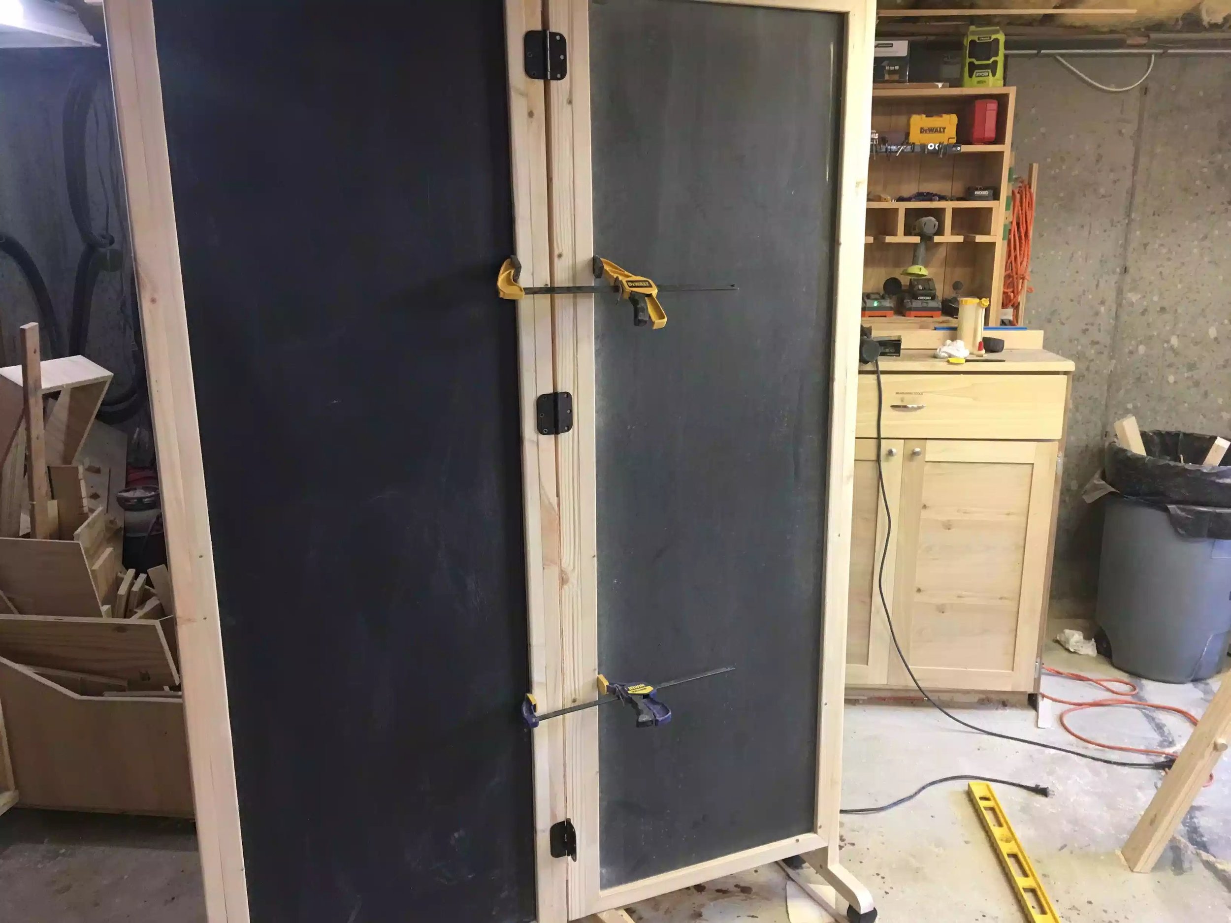 Here you can see all 3 hinges attached to the left side and the clamps 2 on each side holding everything together until I get to the other side of the hinges