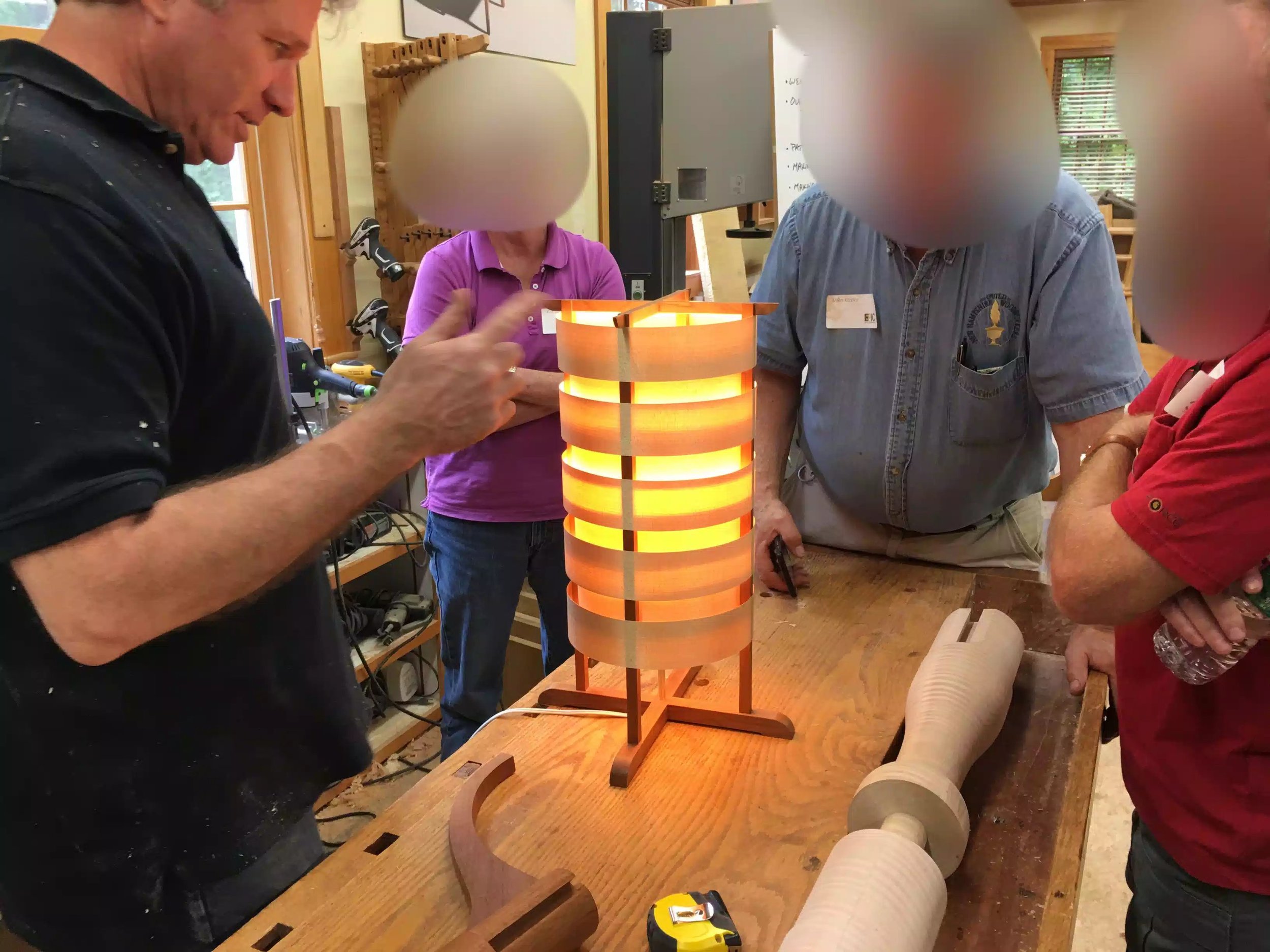 The lamp is beutiful and its made with pieces of veneer that acts as the shade and the body is made up of a few pieces of wood with half-lap joinery.