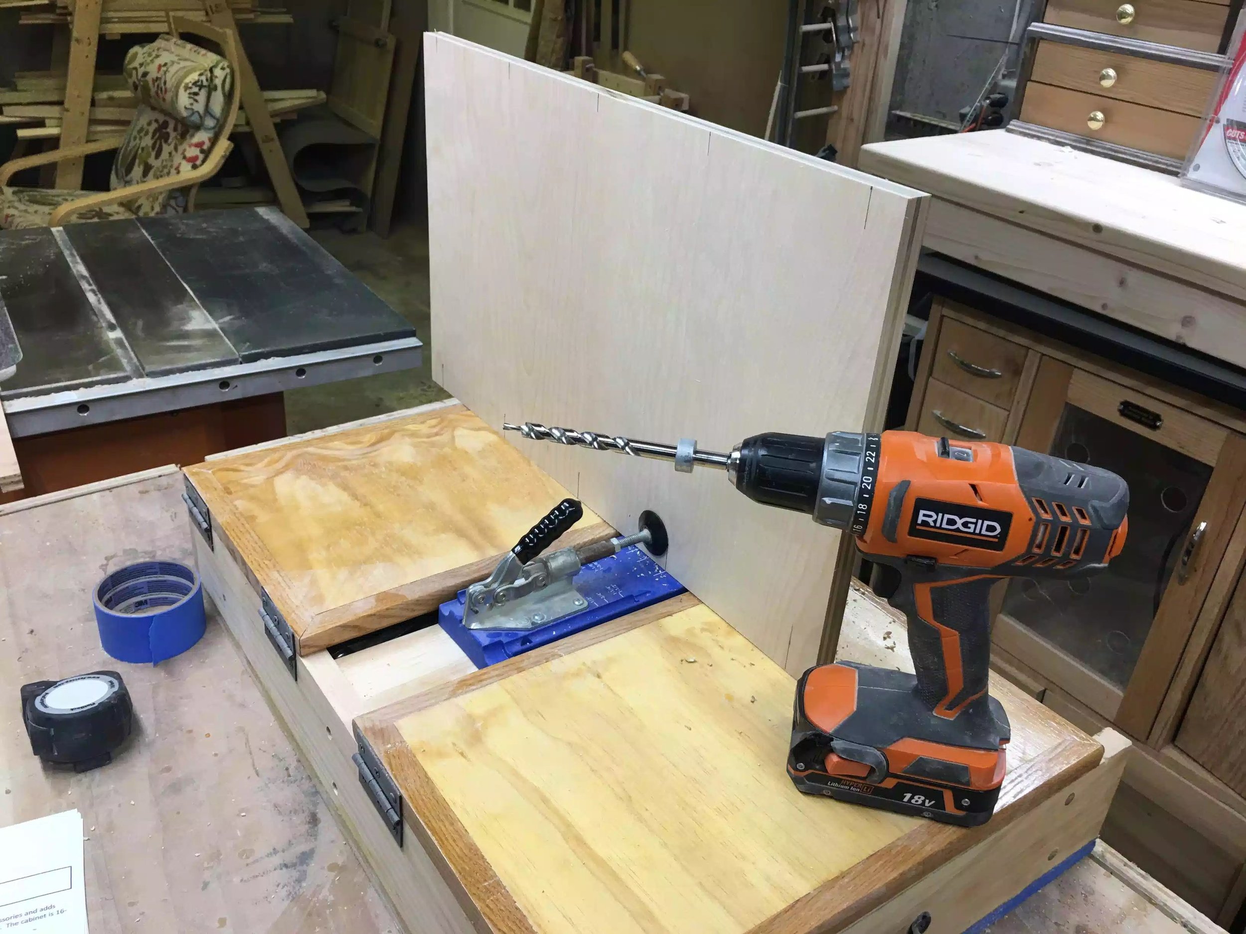 In this picture I am getting ready to drill the pocket holes with a special drill bit that drills a tapered hole to receive the screw.