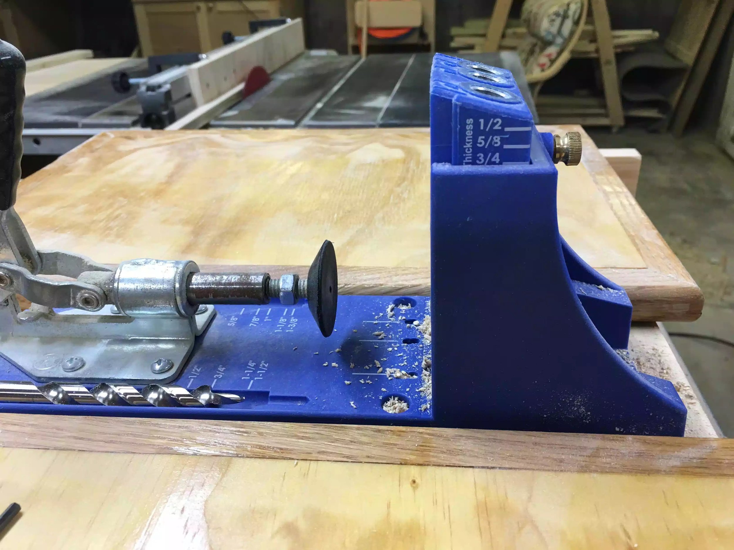 Here is a side view of the jig, the jig has a movable insert block that you need to move that worls in accordance with your stock thickness.