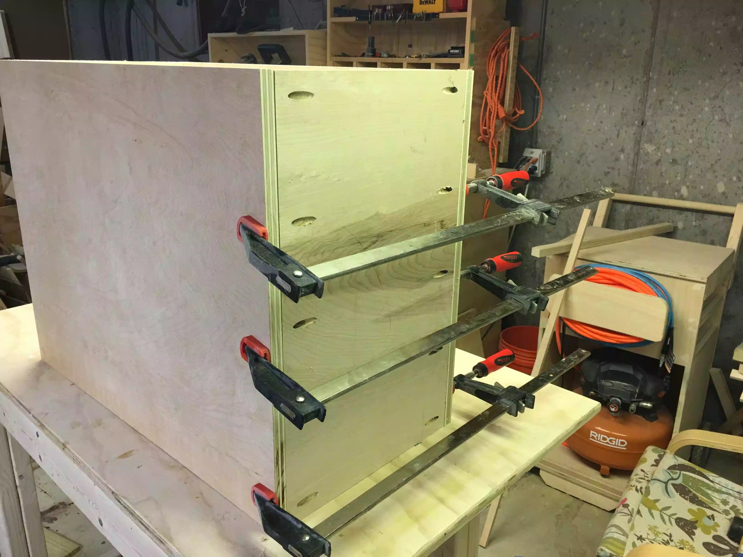 Here you can see the actual base of the cabinet being clamped together getting ready for the pocket hole screws to be inserted.