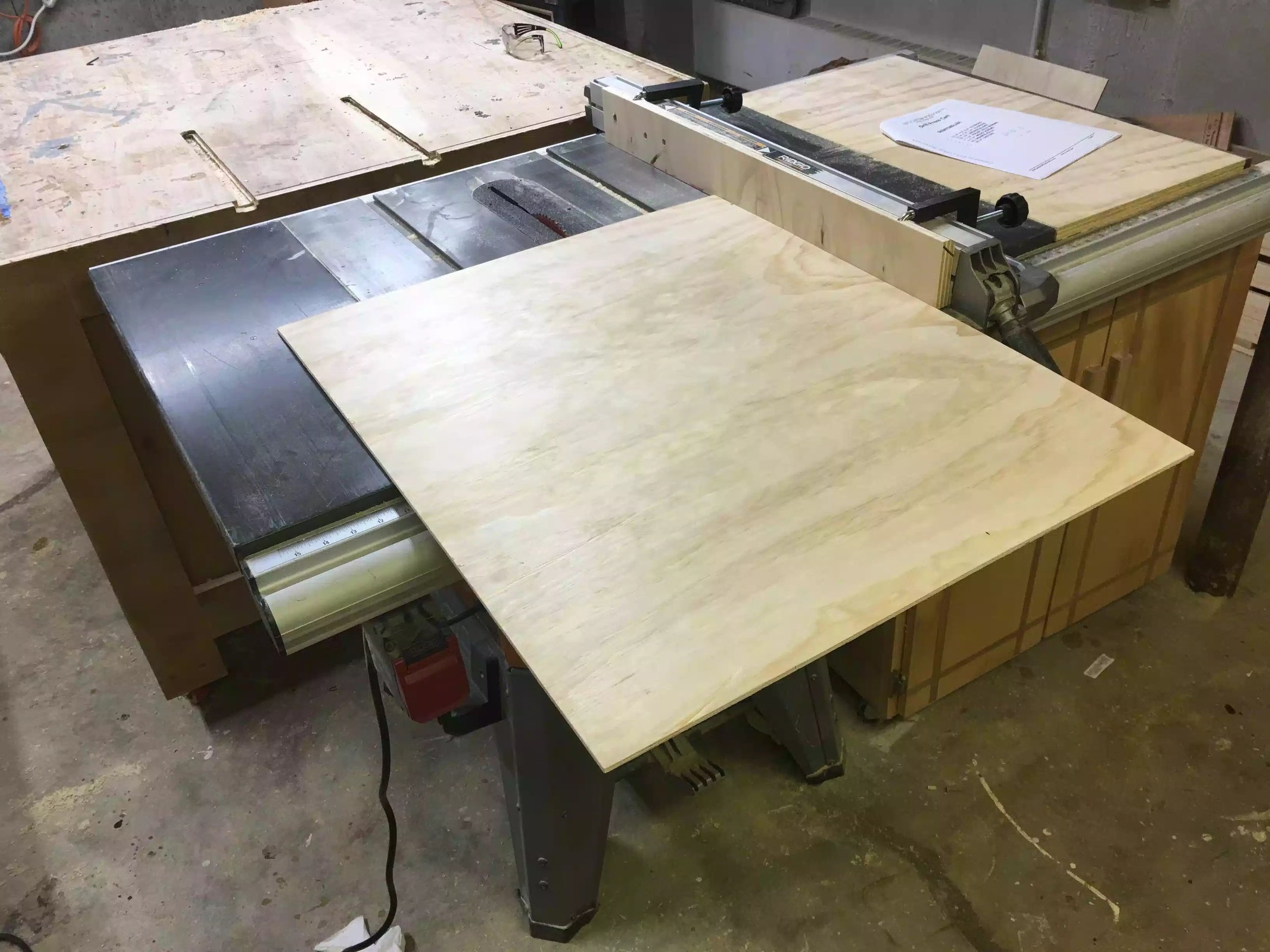 Here I am getting ready to rip the back panel to size on my table-saw