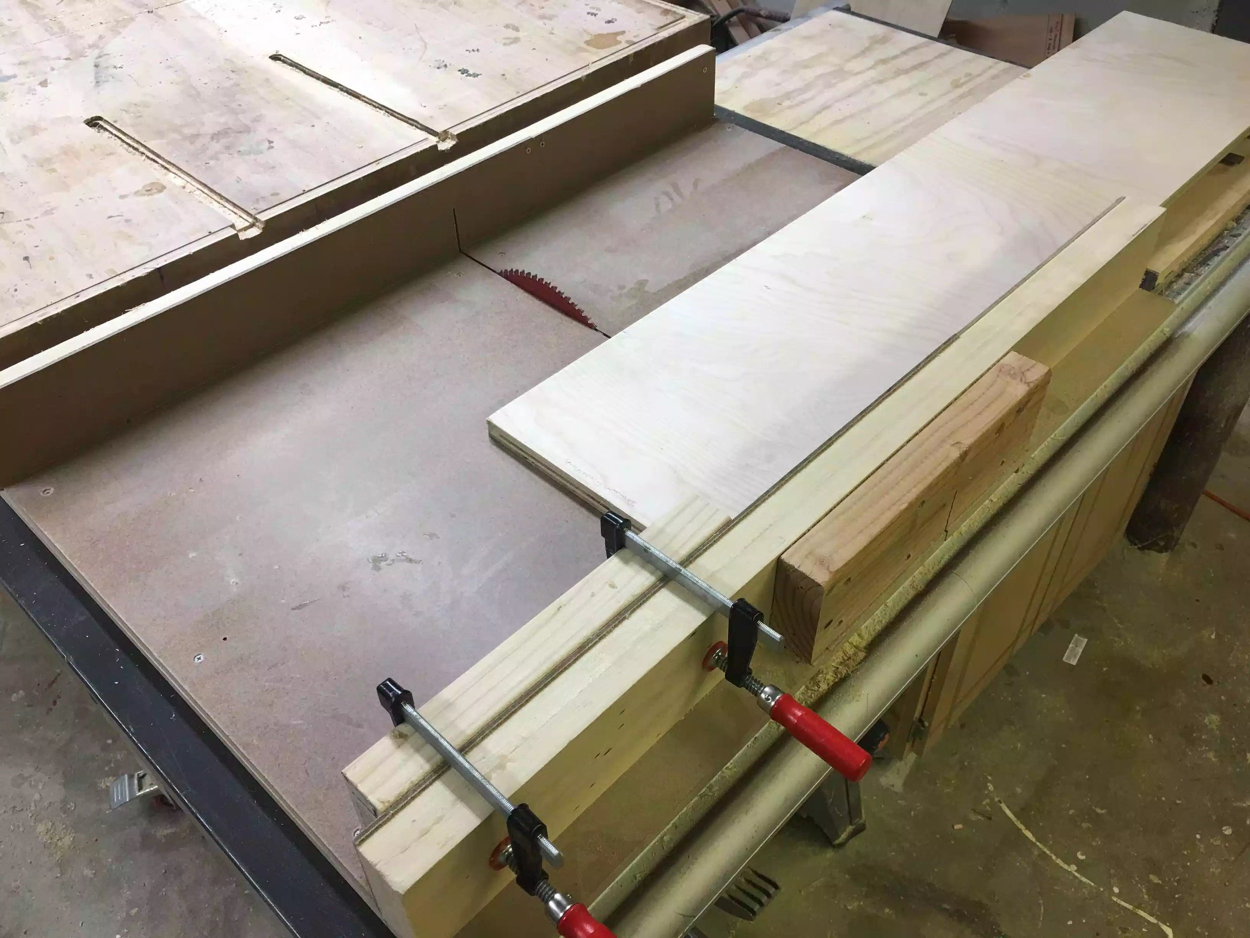 Here is my table-saw cross-cut sled with a stop block set-up on the fence.