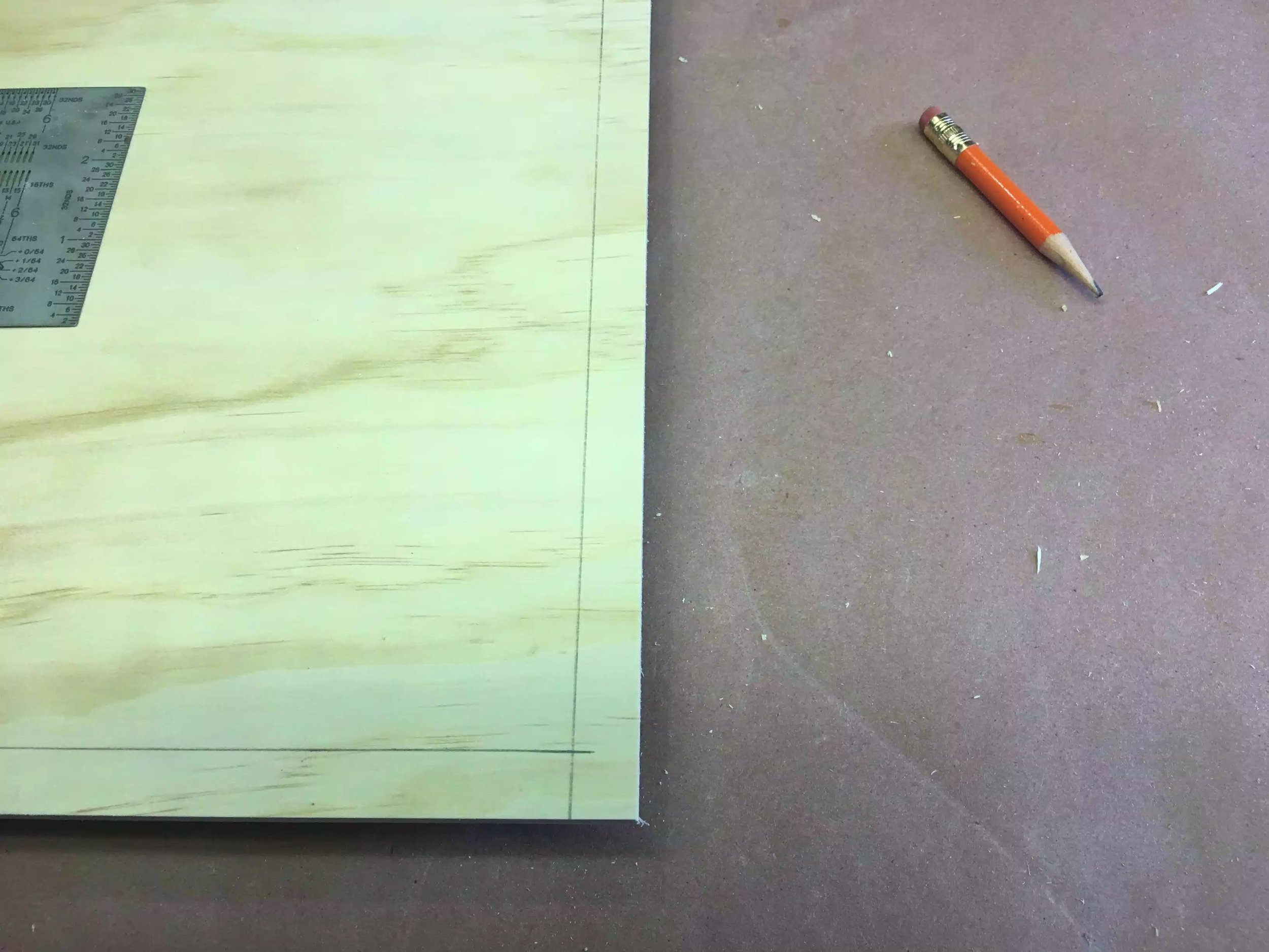 Here is a close up the pencil line outlining the 1/2'' reference line on the drawer bottoms, I needed to do this to all 5 panels 