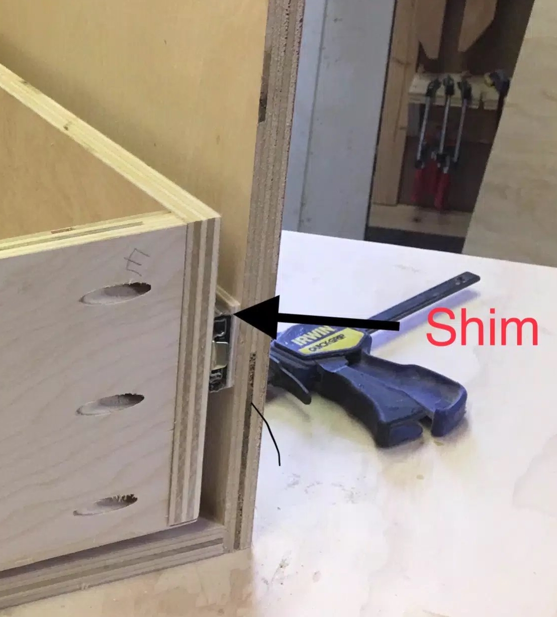 Here you can see how I remedied the bottom drawer slide issue.