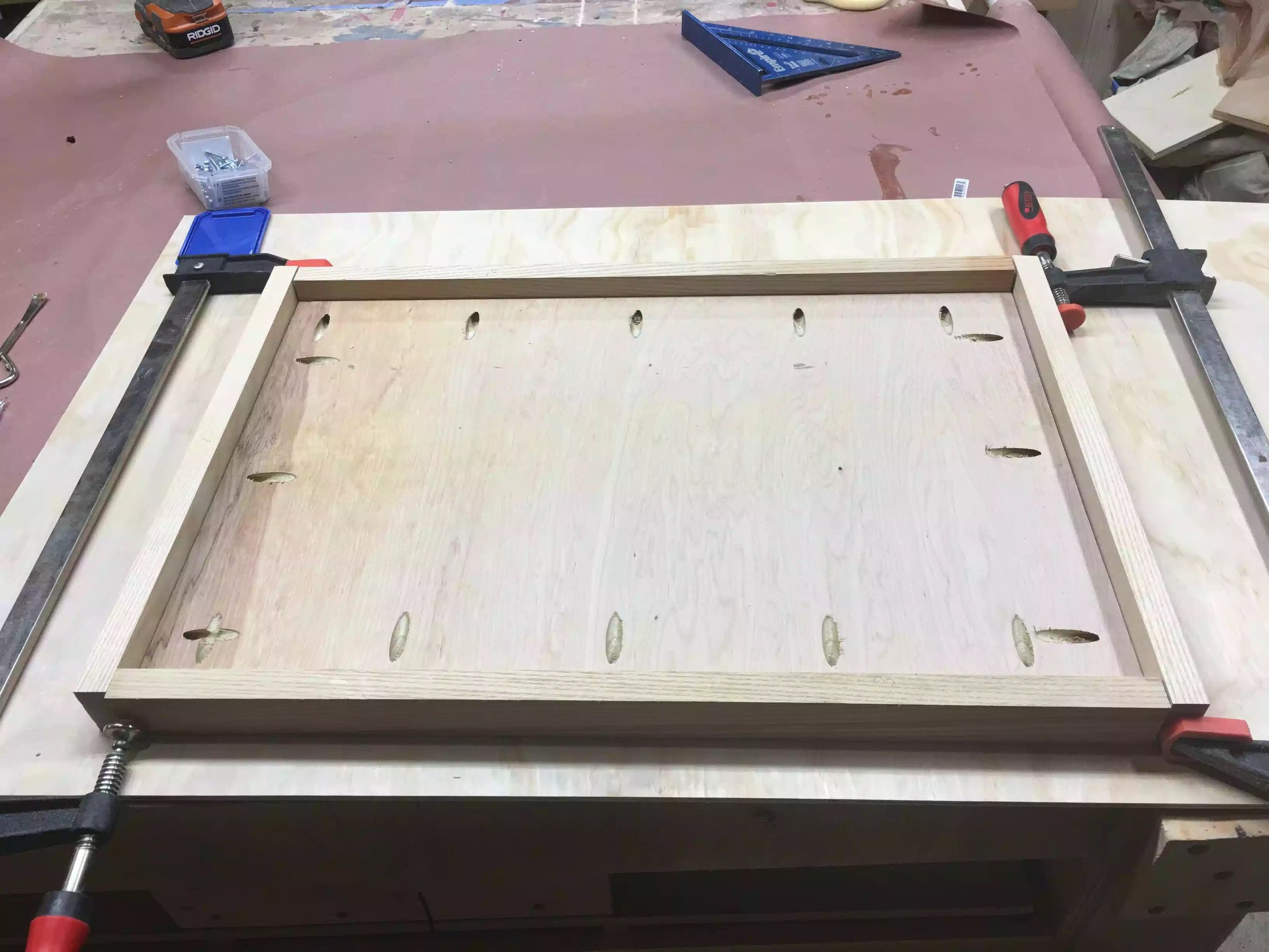 Here you can see the underside of the top, its all clamped up and the hardwood is ready to be added. I still need to add the cleats to the left & right of the panel so as that I can attach it to the cabinet.