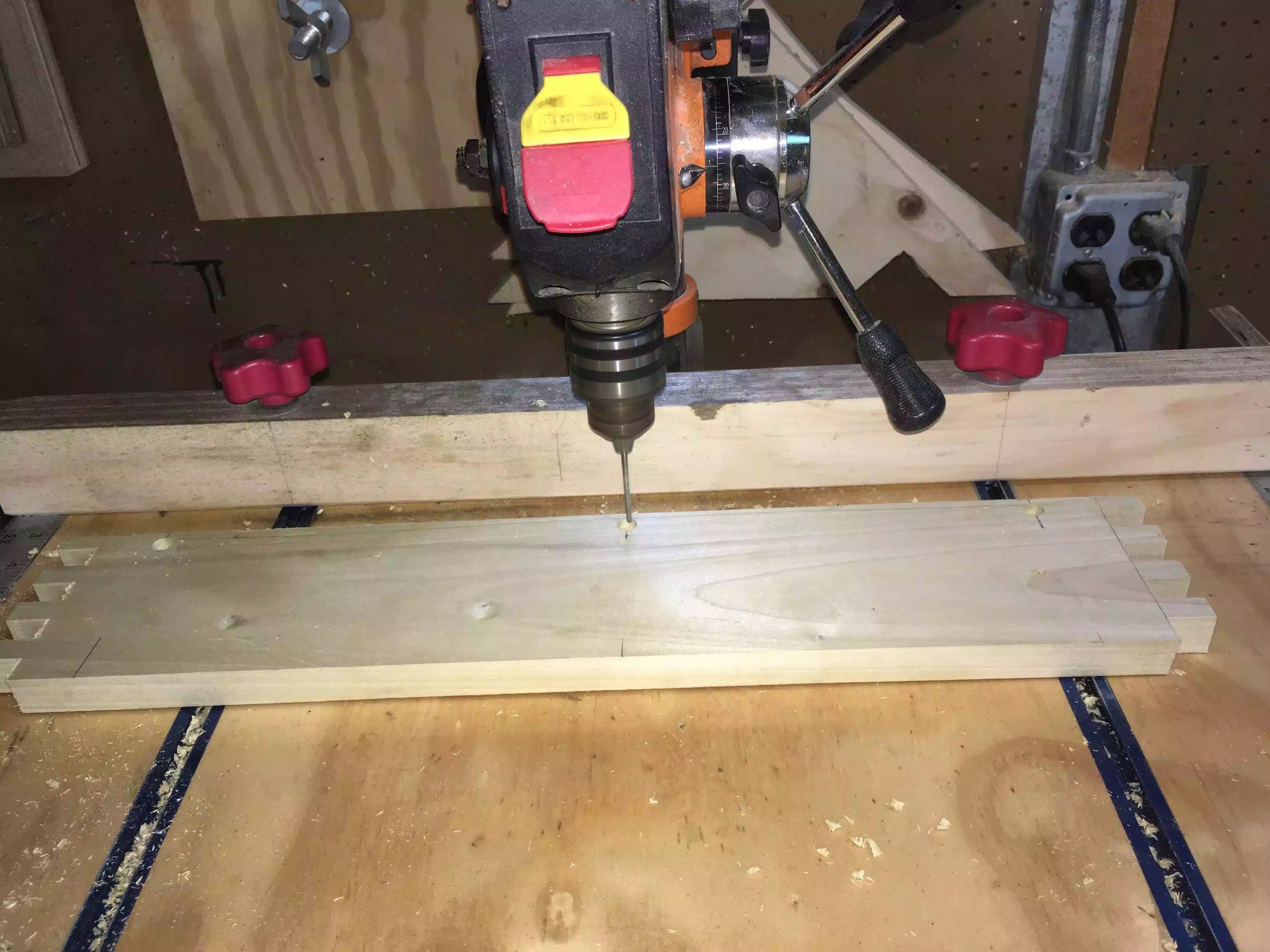 Here I am working on one of the sides, using smaller diameter drill bit to make through holes. Its so much easier doing this now than doing it after the box is assembled.
