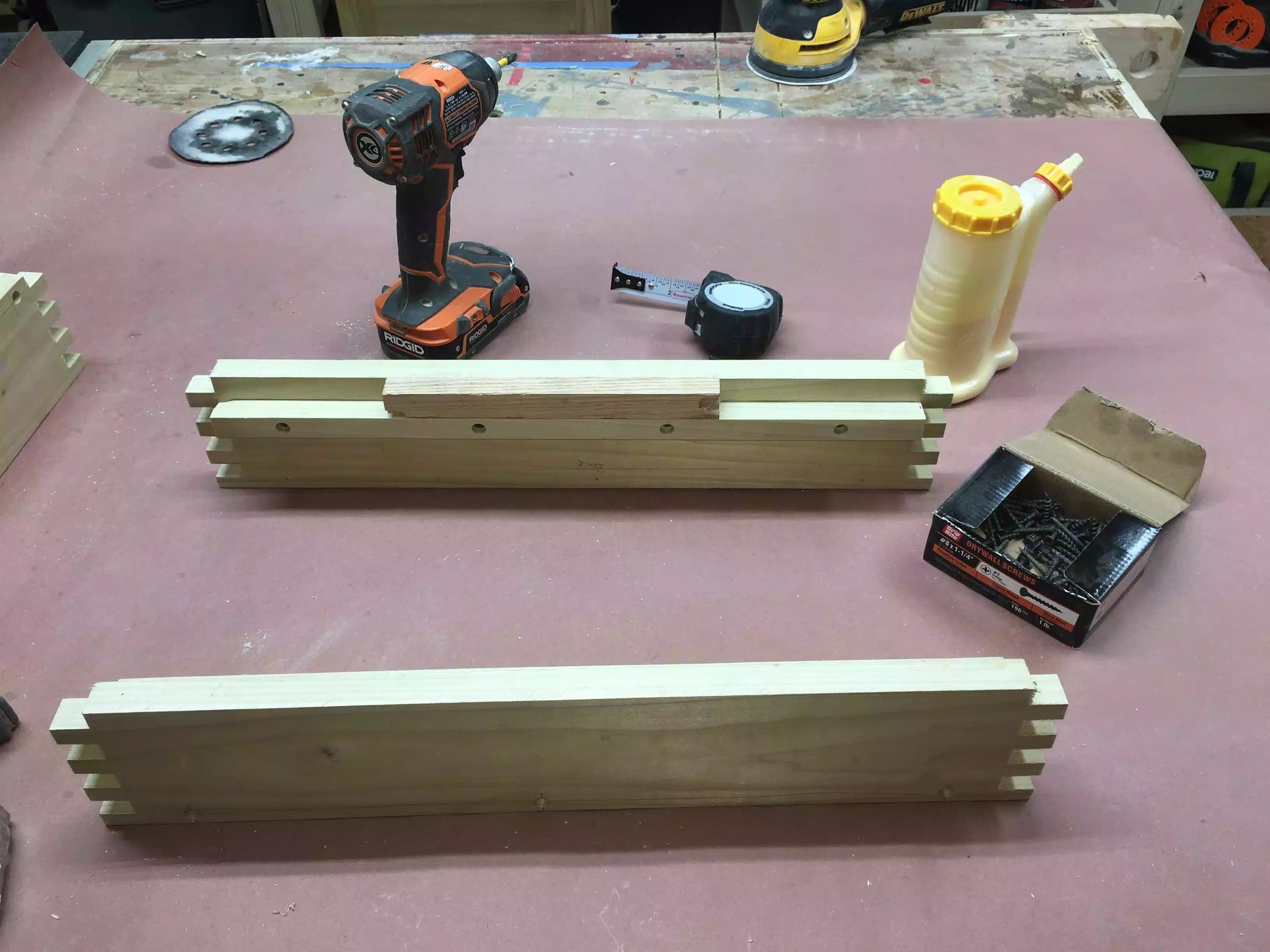Using a spacer block to determine where to place the cleat so as that the tray is flush to the top and will not interfere with the sharpening of tools when I am actually using it. Everything looks fine so I screwed 4 screws into each cleat, overkill I’m sure but at least I am assured that it will never move.
