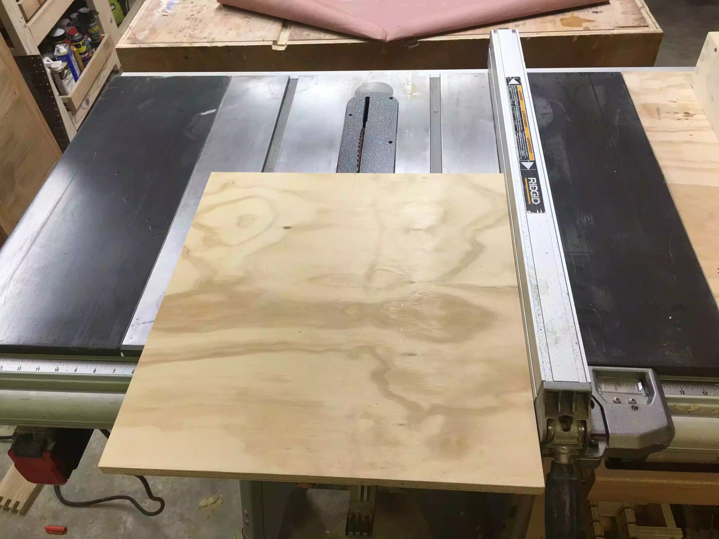 I used this scrap piece of 3/4” plywood for the base. I am cutting it down to final dimensions here on the table-saw.