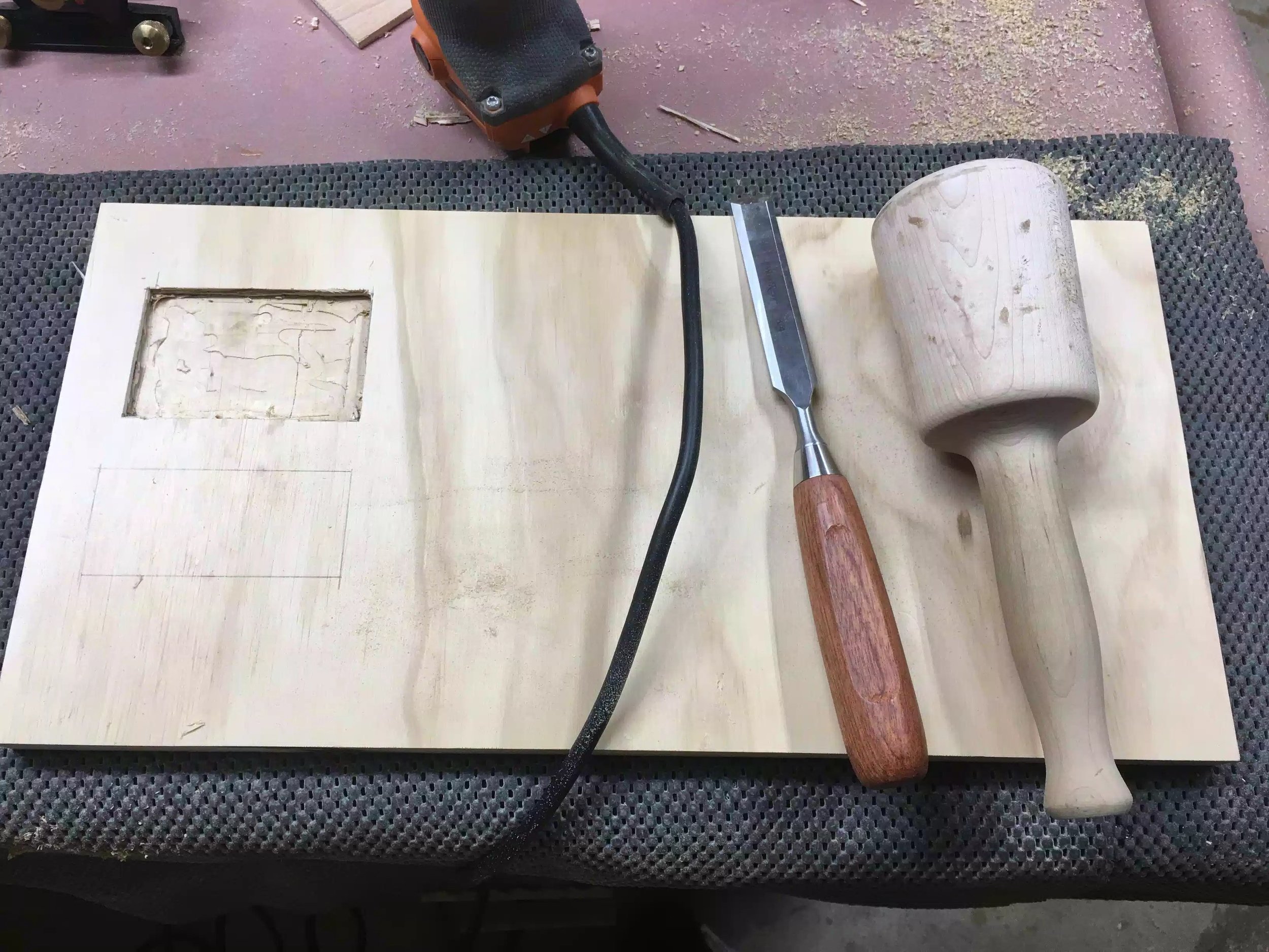 I used my palm router to remove the bulk of the recess and then went back with my chisel and mallet to clean up the edges.