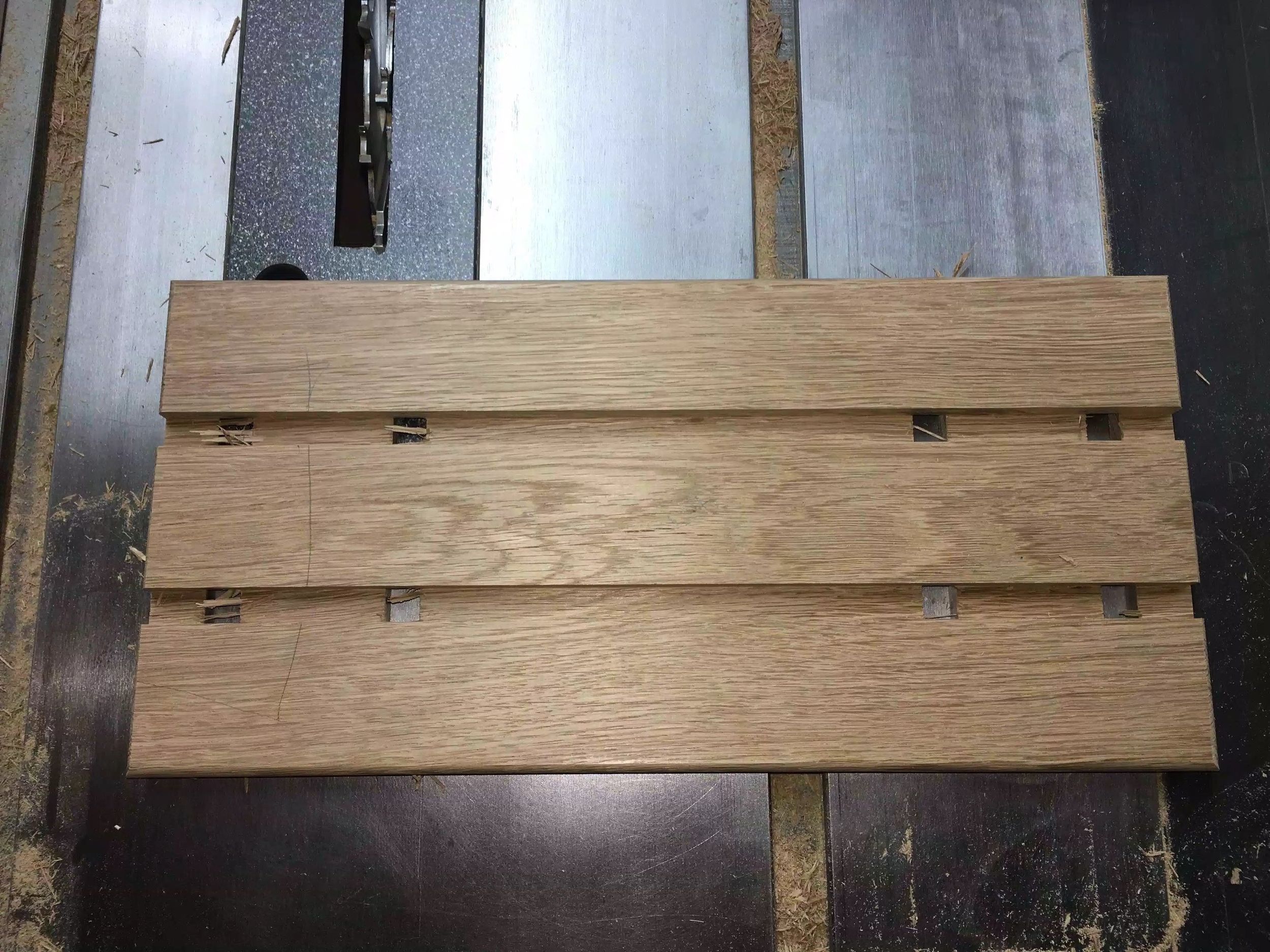 I forgot to take a picture of the work-piece with just the 2 long slots cut, just disregard the under side cuts, that will be covered later.