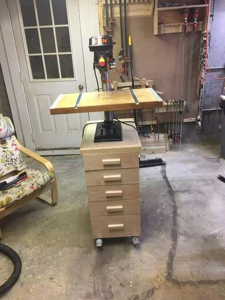 Here is my current drill press set up, if you would like more information on how I made the drill press table or drawer cabinet you can find more information here.
