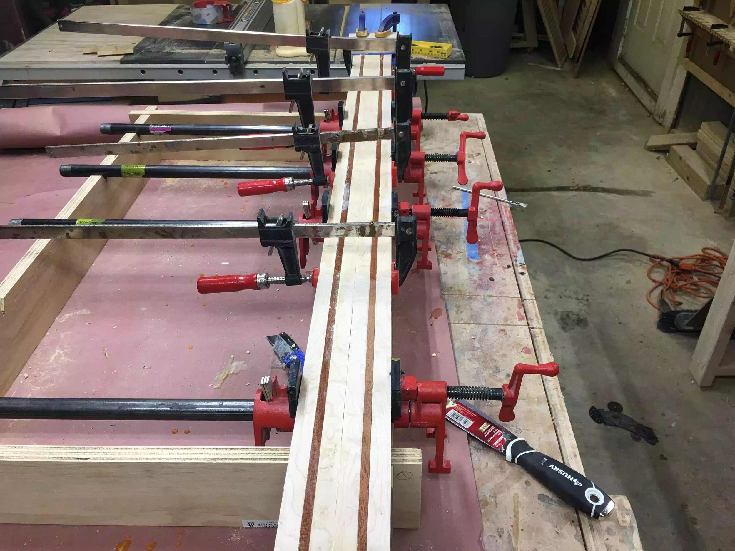 Here you can see the different design in the clamping jig. Most of the blank is maple with 2 contrasting Sapele pieces on each side.