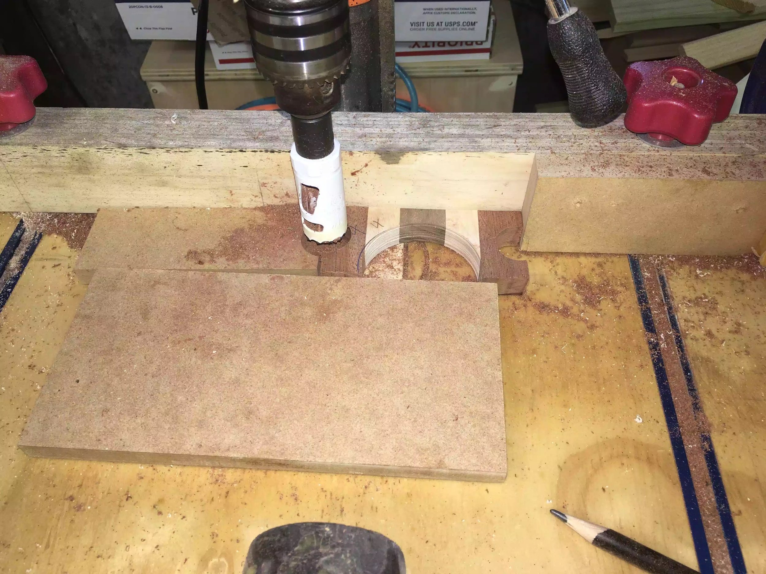 Here you can see how I surrounded the work-pieces I used scrap wood and double sided tape to secure the pieces. Worked great