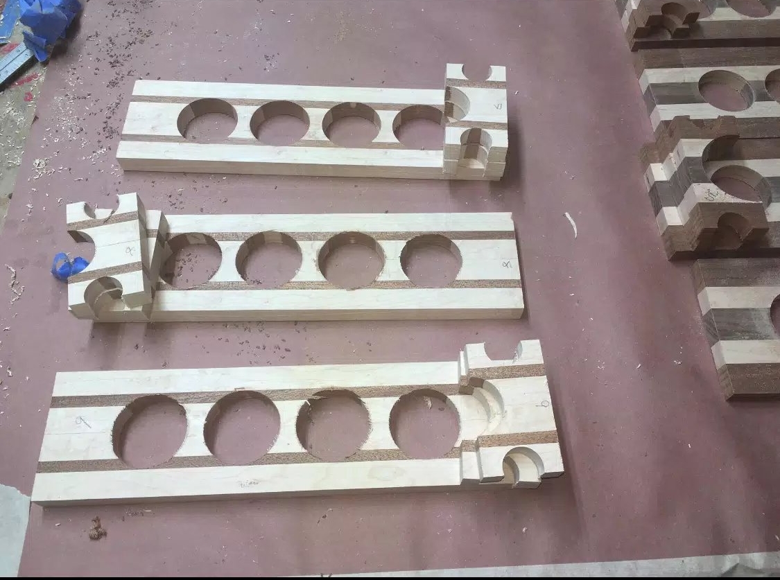 Here is all the holes finished, next I needed to bring all these piece to the router table. This picture is of the maple and Sapele flights.
