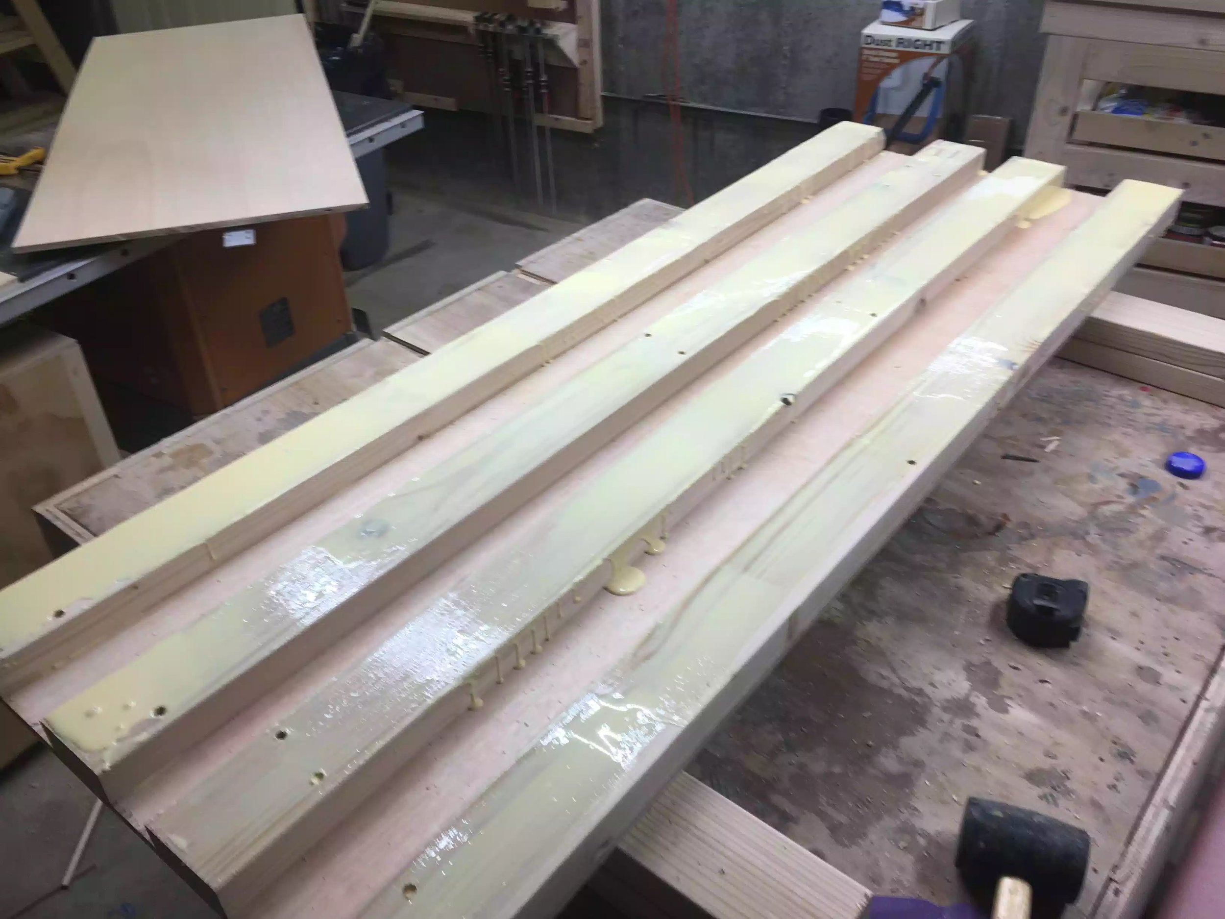 I didn’t spare any glue on this glue-up but this is a look at how the divider was constructed, I did place a few countersunk screws into the lumber to hole it in place so as that I could flip the divider to the other side and attach the other panel.