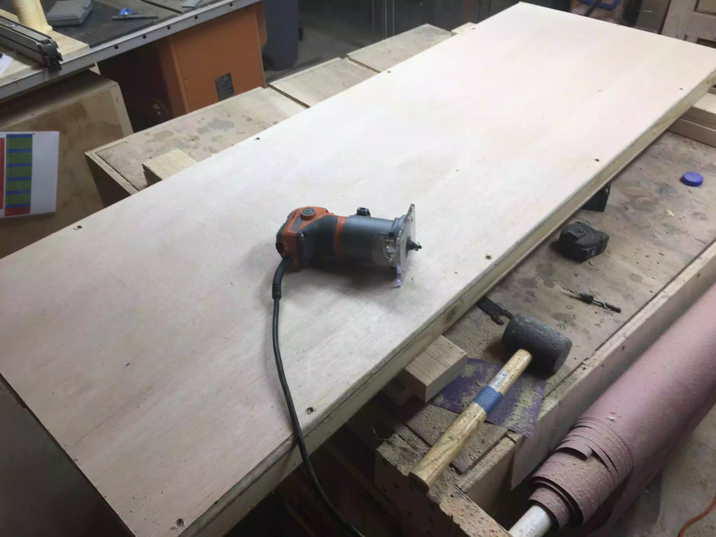 Both panel;s have been attached and I about to use my router to round-over the sides of the divider.