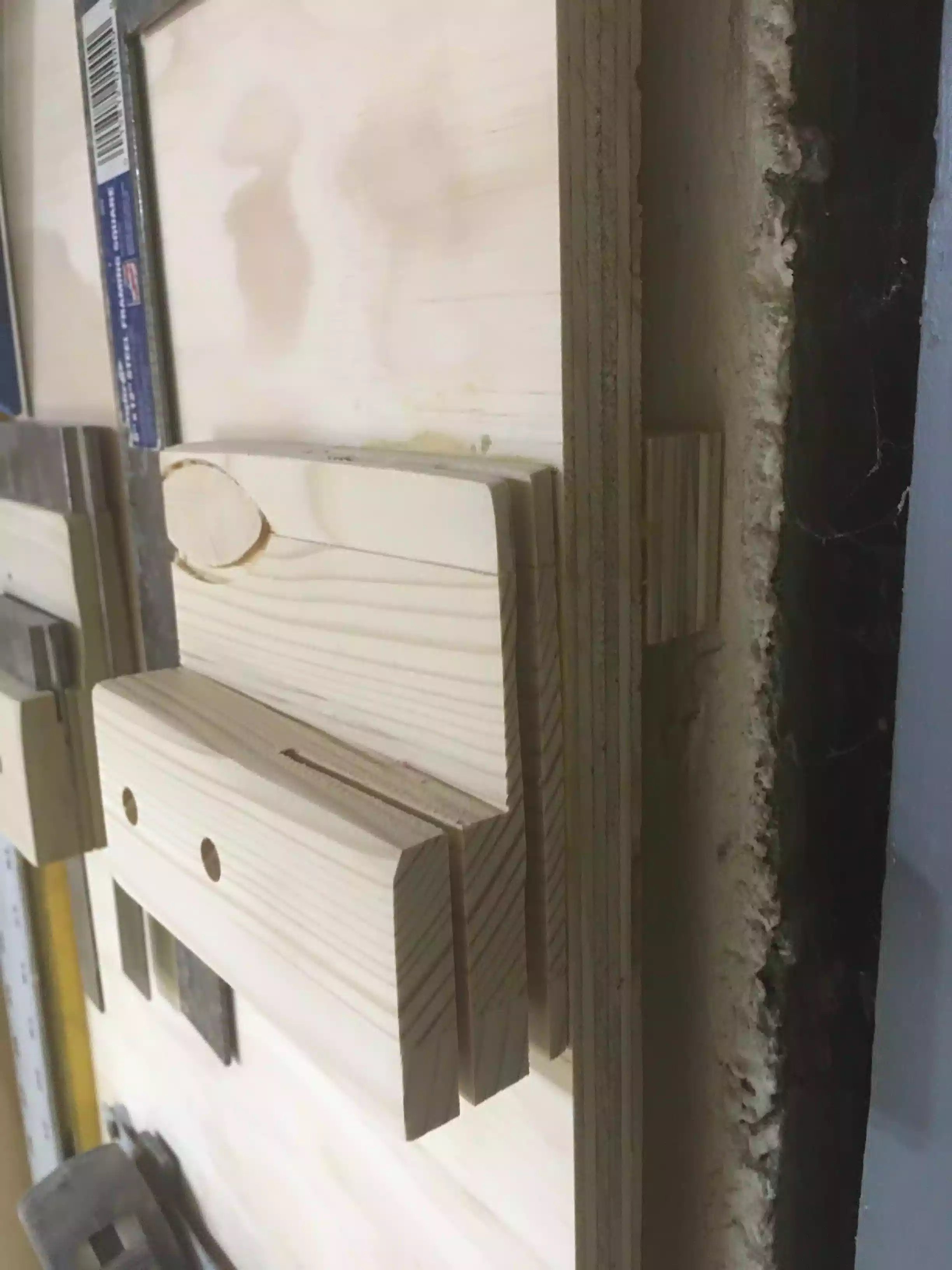 The holders are nothing more than a block of wood with some strategically placed Kerf cuts so the tool can slide in and out.