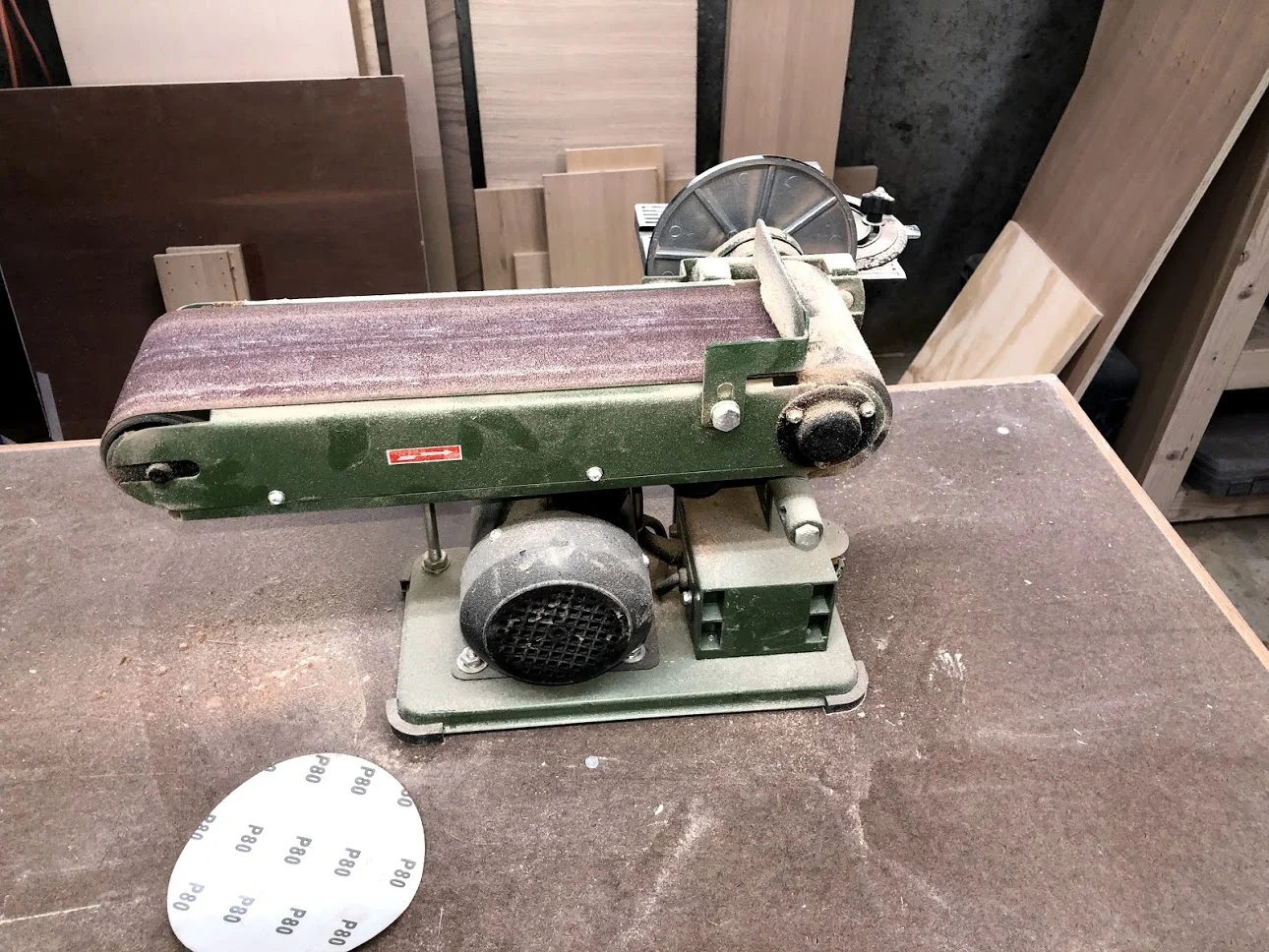 Belt sander installed with 100 grit belt sanding paper.