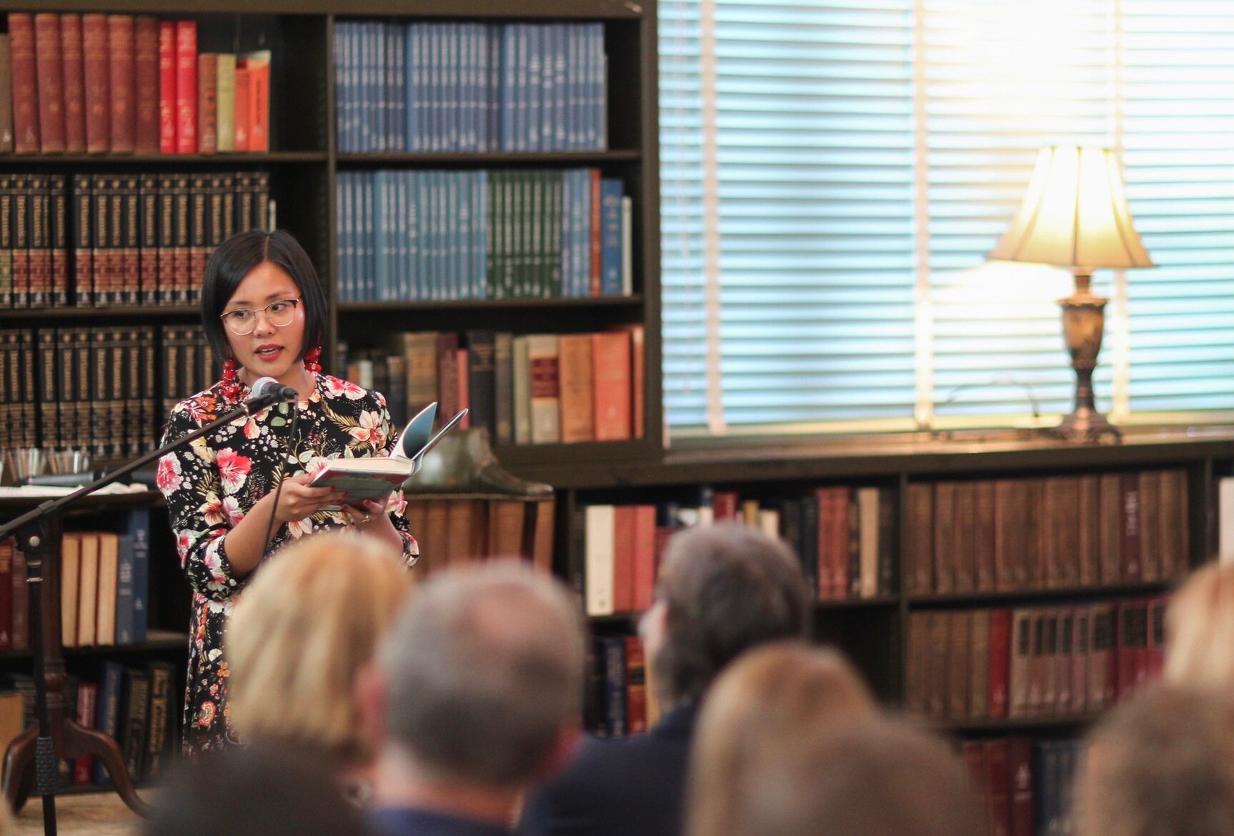 Cinelle reading Monsoon Mansion