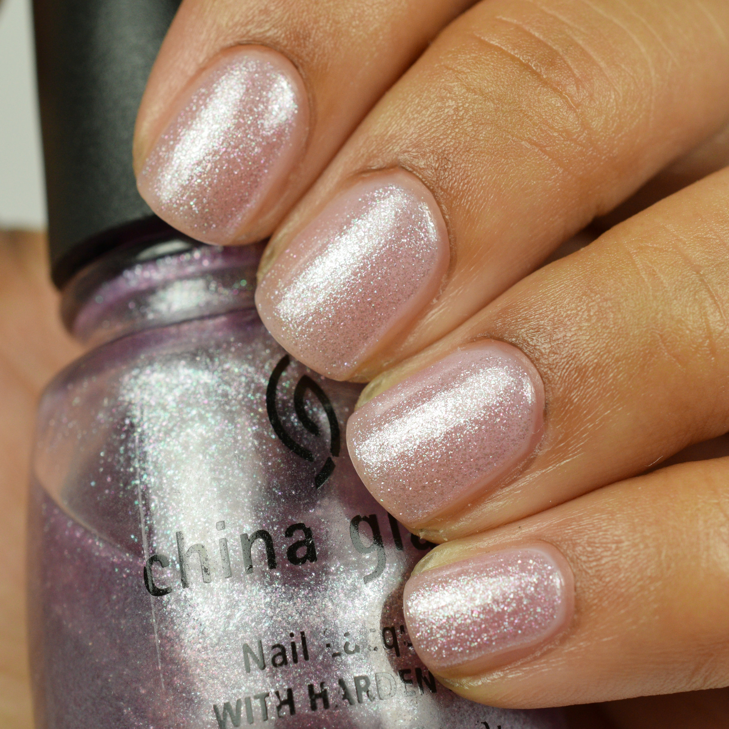 China Glaze Happily Ever After over OPI Care To Danse.jpg