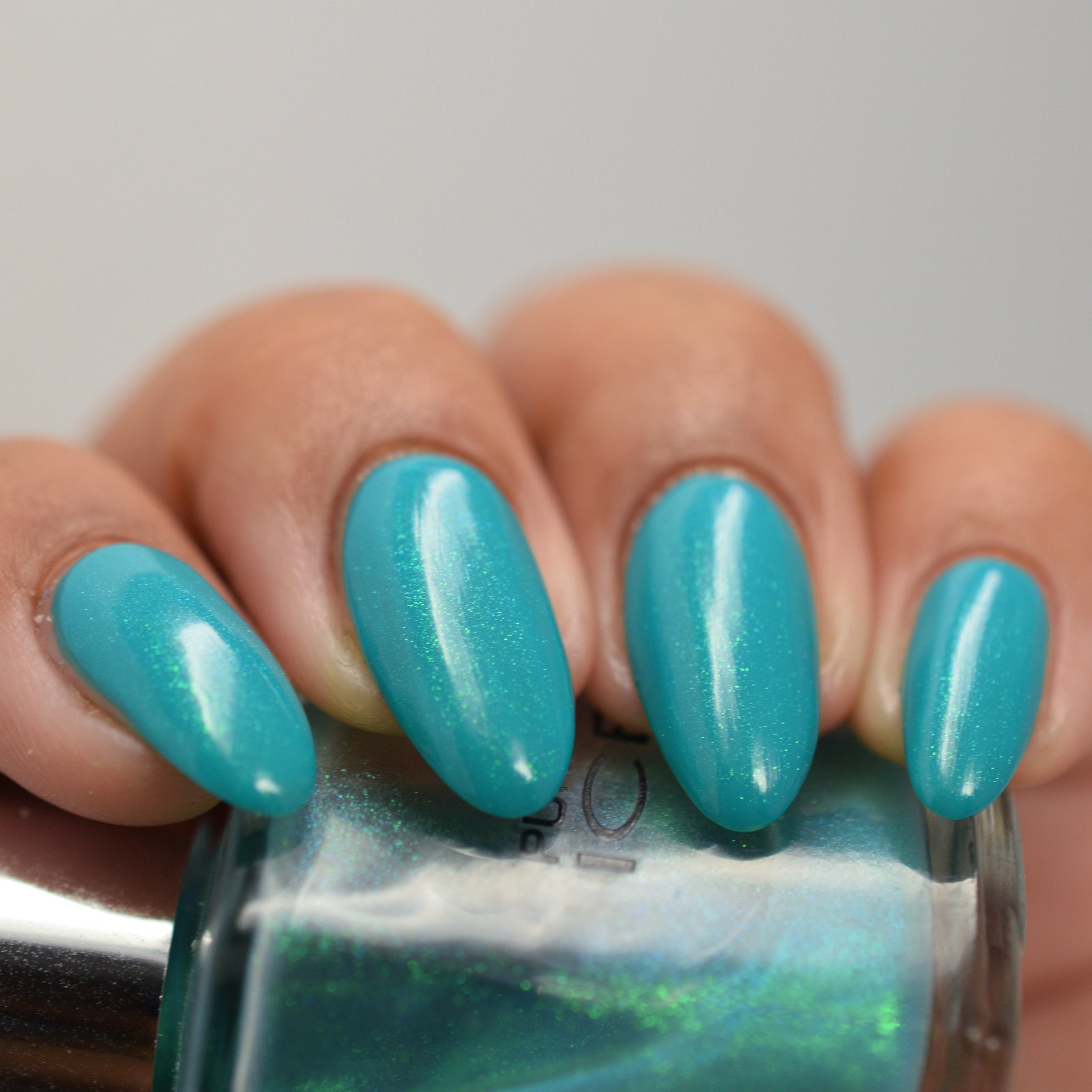 Pure Ice Heartbreaker over OPI Dance Party Teal Dawn 2.jpg