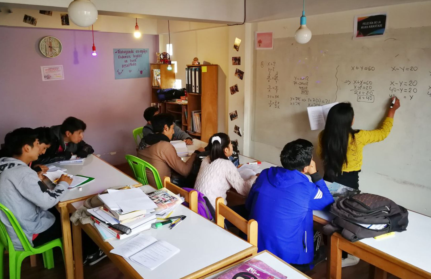 The young people take part in maths class in preparation for their further education entrance exams.