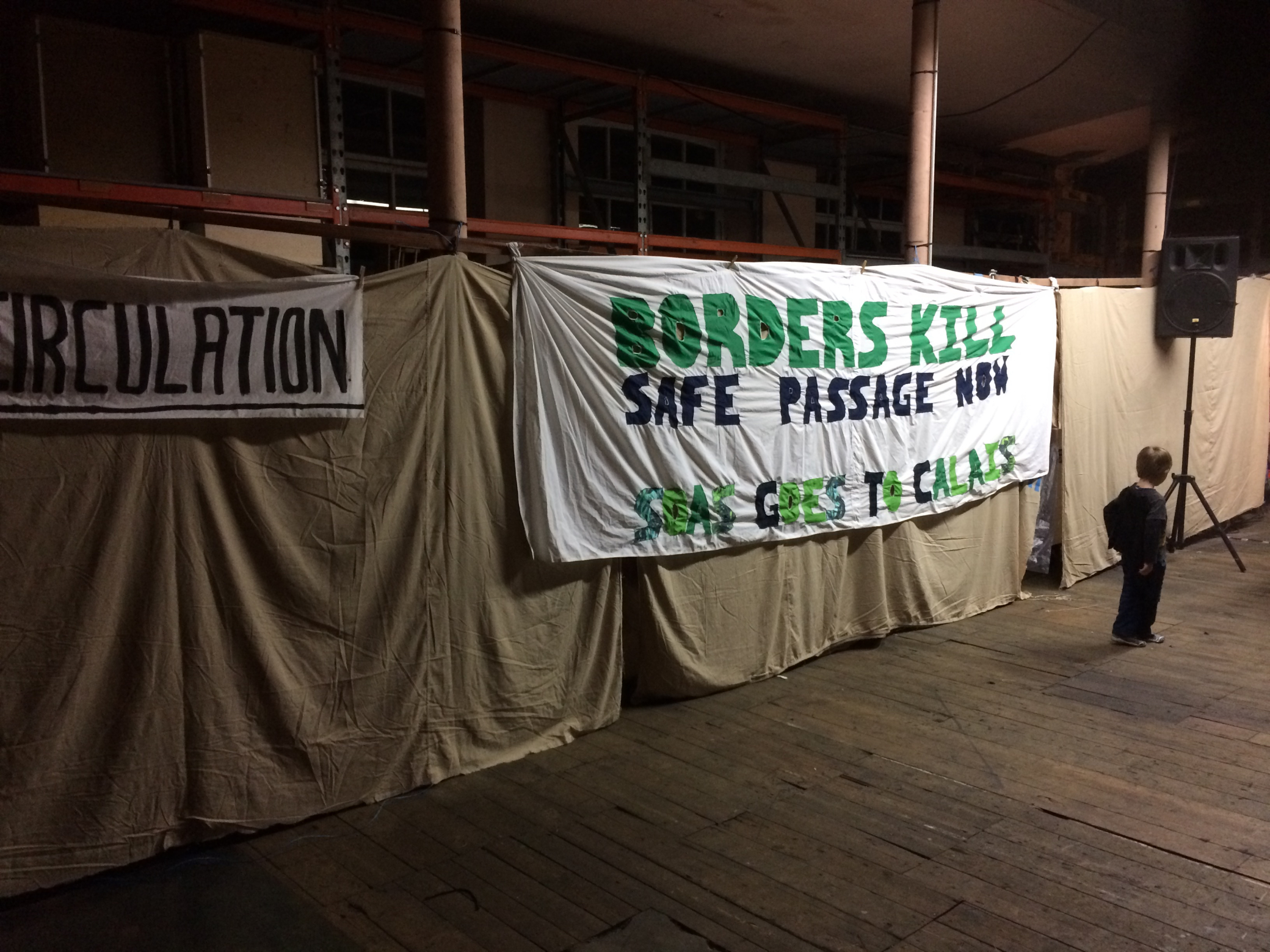A banner brought to Calais by London University SOAS student volunteers