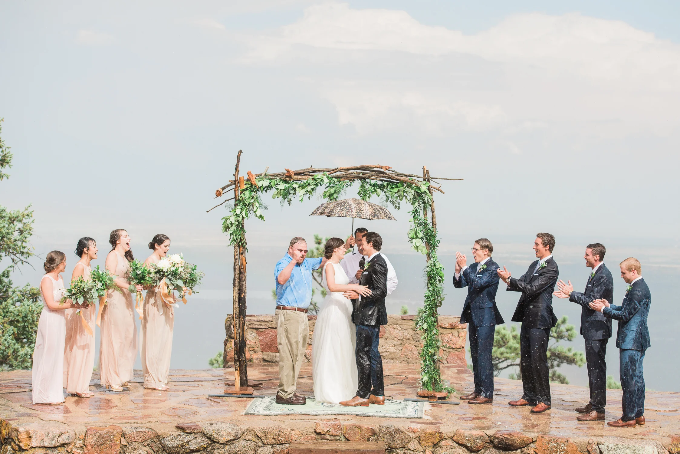 Rainy Wedding Ceremony at the sunrise amphitheater in Boulder Colorado