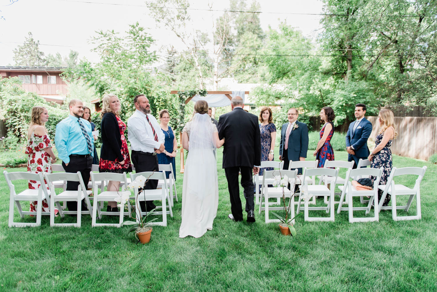 Dad walking his baby girl down the aisle to get married.